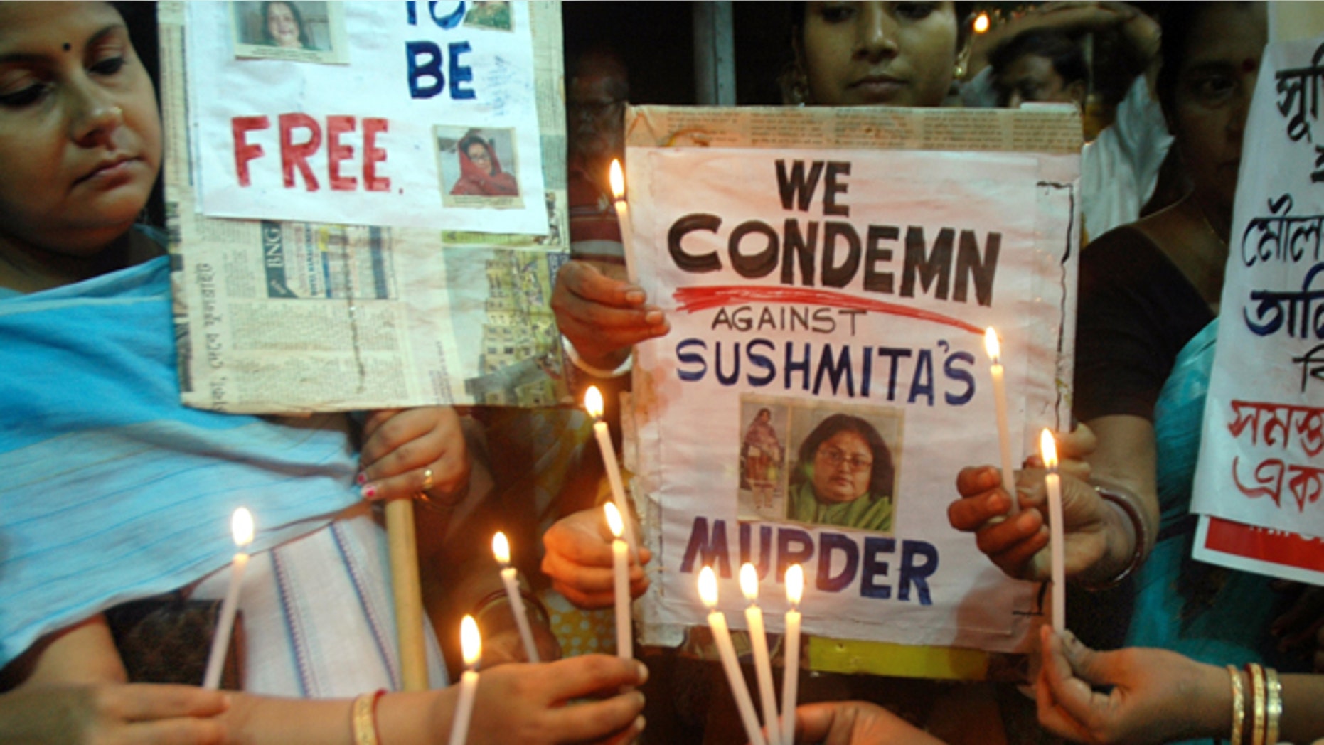 Sept. 6: Indian women participate in a candlelight vigil condemning the killing of Indian author Sushmita Banerjee in eastern Paktika province.
