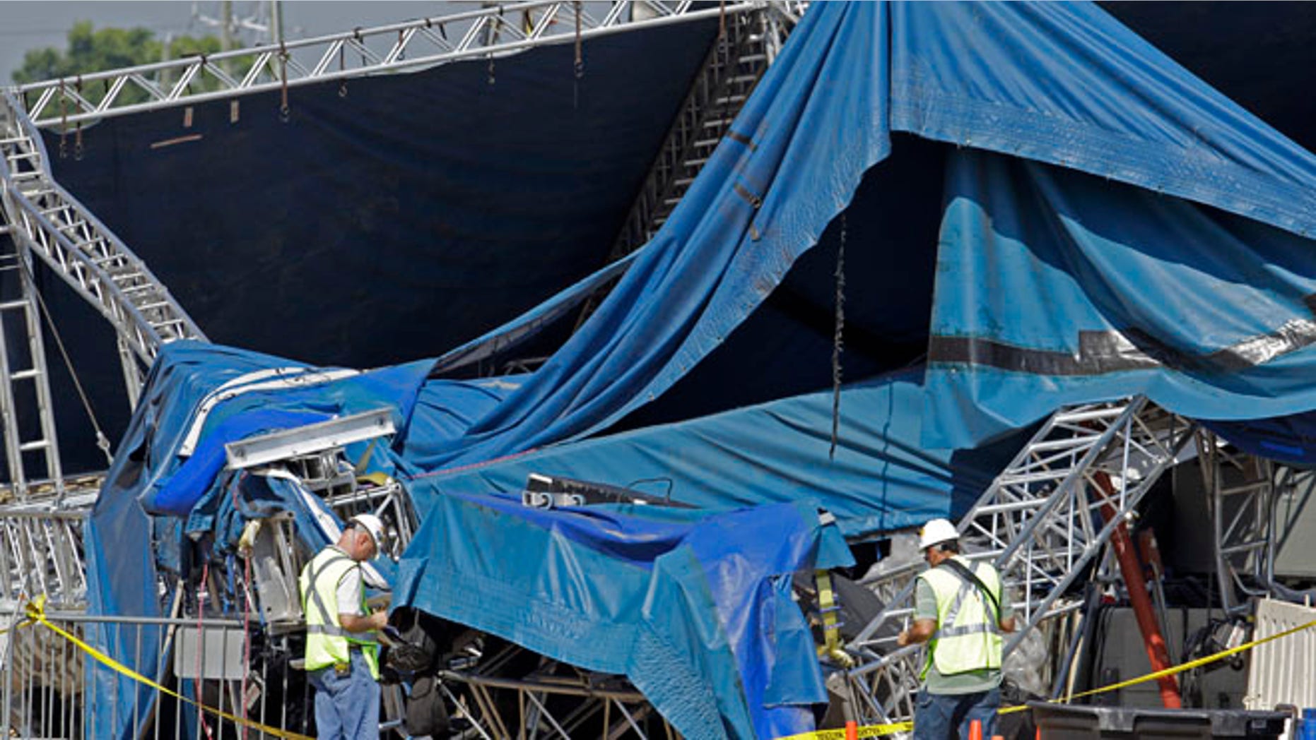 Aug. 17, 2011: investigators examine the stage that collapsed on Saturday at the Indiana State Fair in Indianapolis.