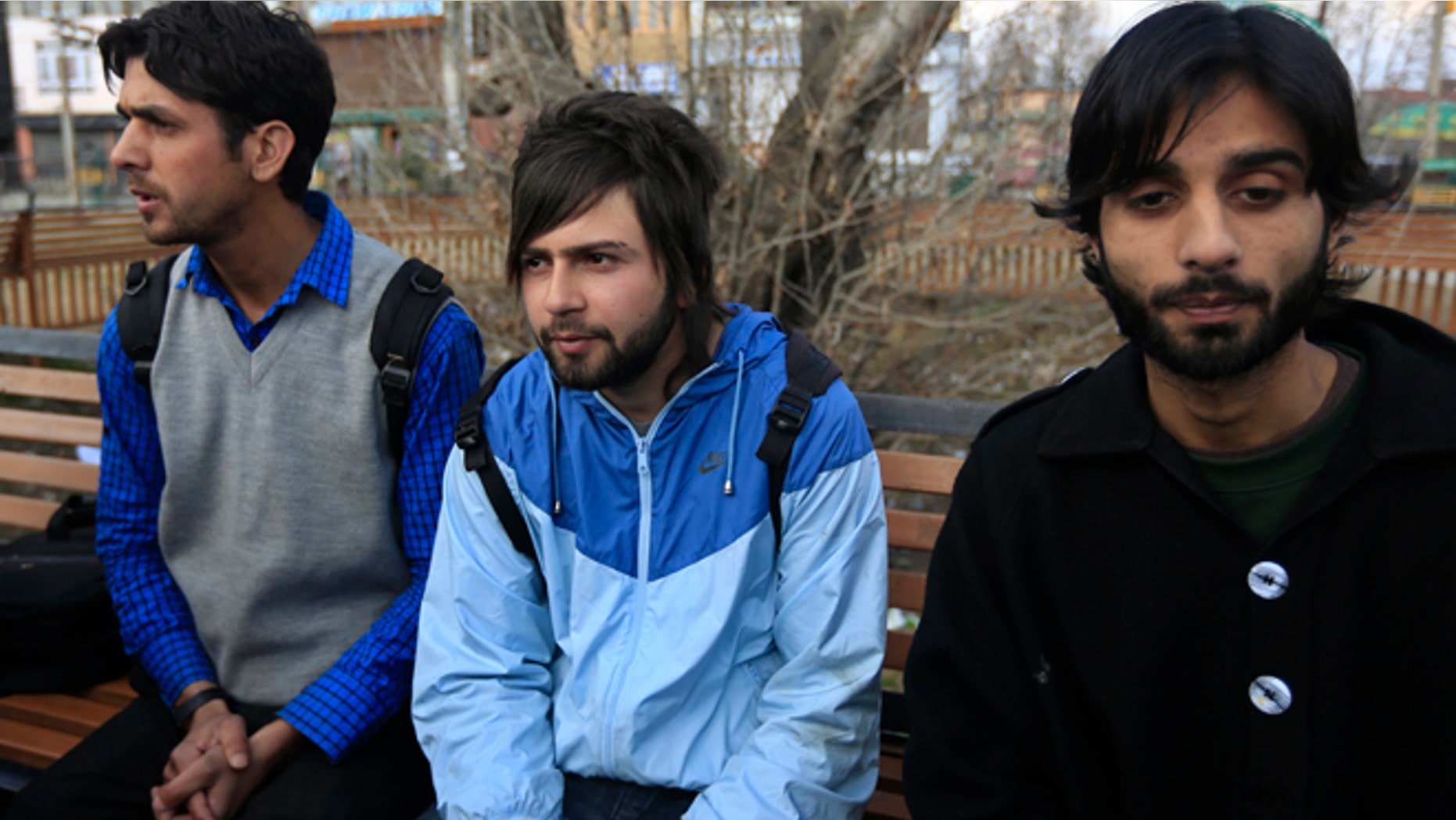 March 6, 2014: Three among the dozens of Kashmiri students expelled from their university from left, Gulzar Ahmed, Muteebul Majid, and Aijaz Bhat, speak to journalists in Srinagar, India.