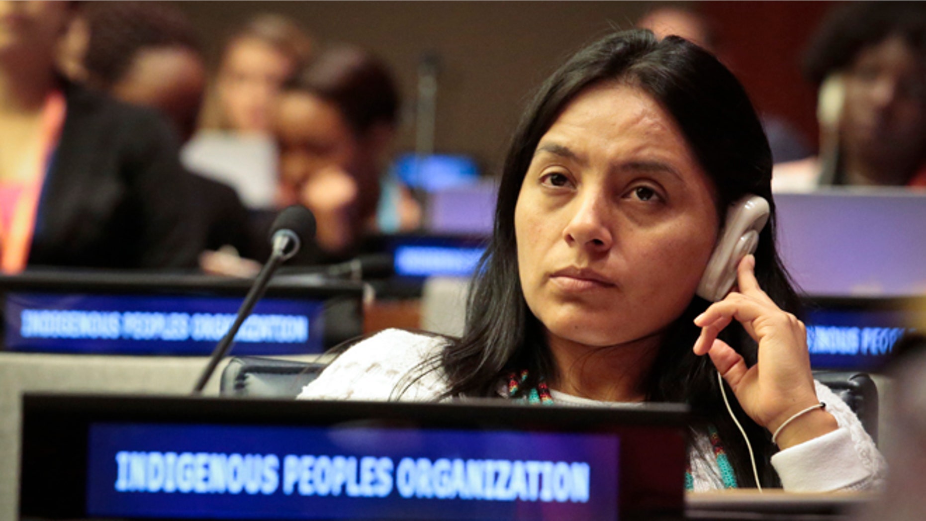Ati Quigua, an indigenous leader from Colombia, listens during the 15th session of the U.N. Permanent Forum on Indigenous Issues, Tuesday May 17, 2016 at U.N. headquarters. (AP Photo/Bebeto Matthews)
