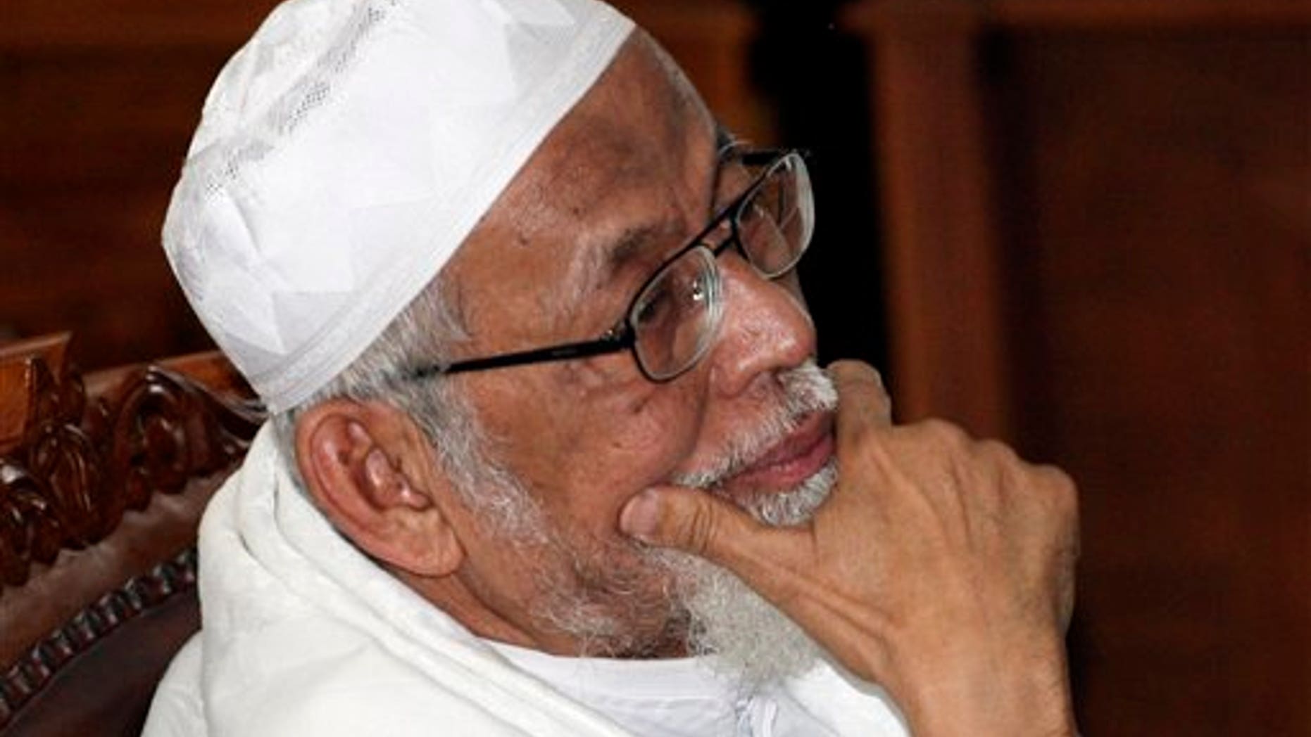 June 16, 2011: Militant cleric Abu Bakar Bashir sits on the defendant's chair during his trial at a district court In Jakarta, Indonesia.