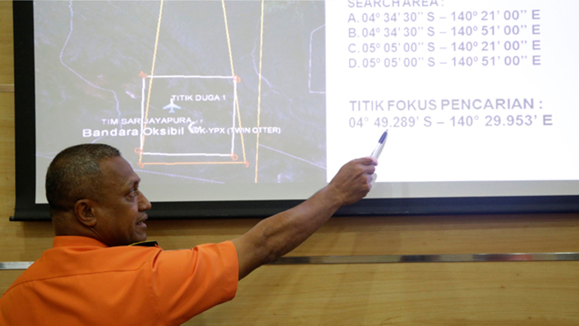 Aug. 17, 2015: National Search And Rescue Agency (BASARNAS) deputy operations director Heronimus Guru explains a search operation for the missing Trigana Air Service flight during a press conference in Jakarta, Indonesia. (AP Photo/Tatan Syuflana)