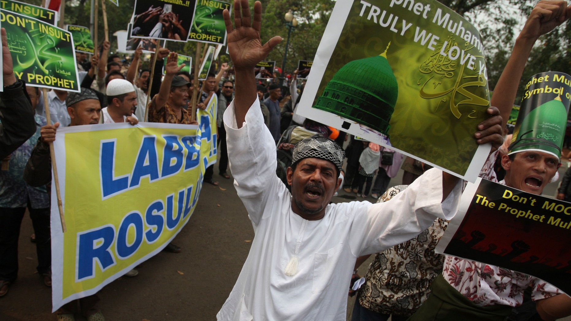 Sept. 21, 2012 : Indonesian Muslims shout slogans during a protest against an anti-Islam film that has sparked anger among followers, outside the U.S. Embassy in Jakarta, Indonesia.