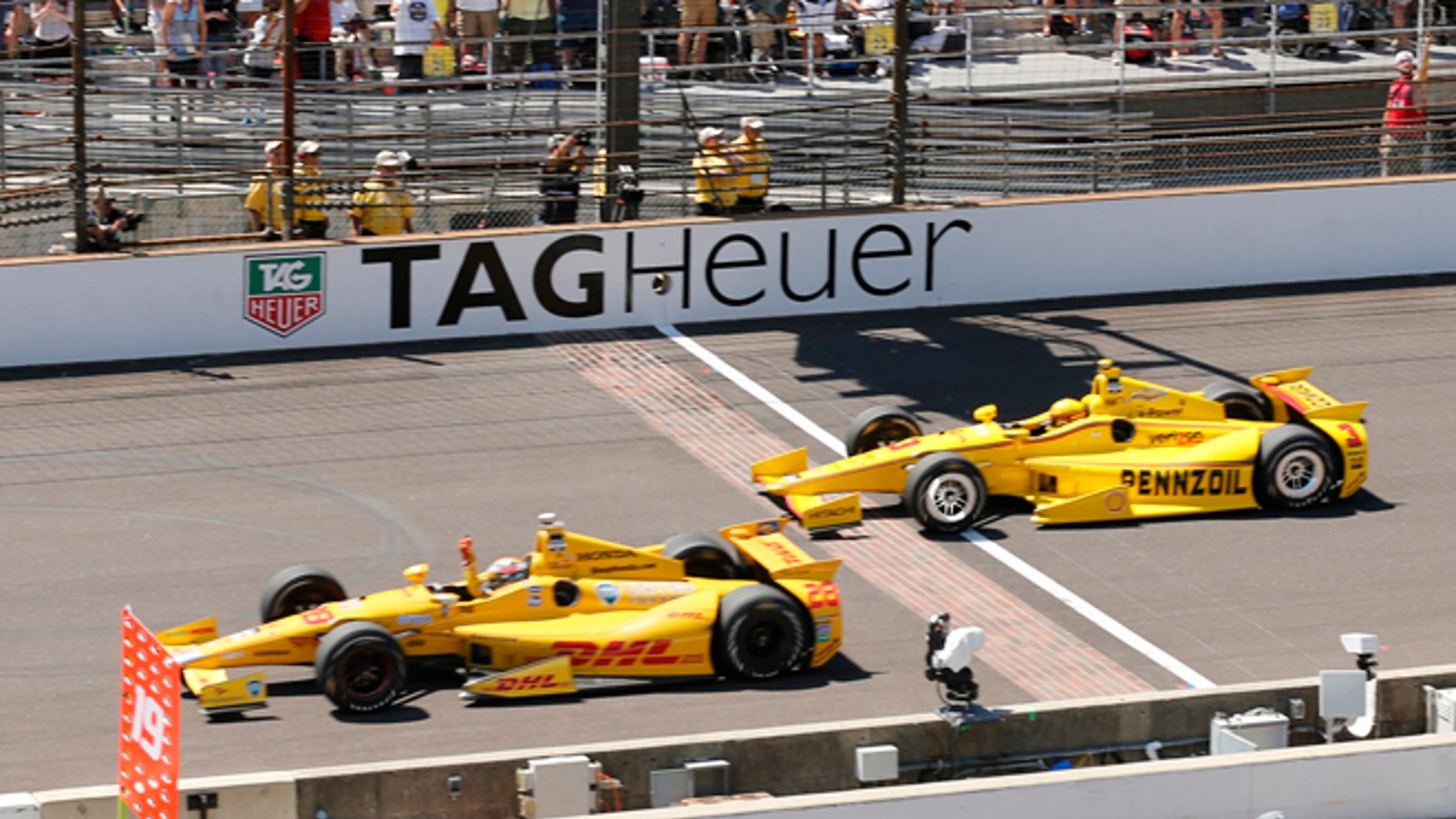 Ryan Hunter-Reay celebrates at the Indianapolis Motor Speedway in Indianapolis, Sunday, May 25, 2014.