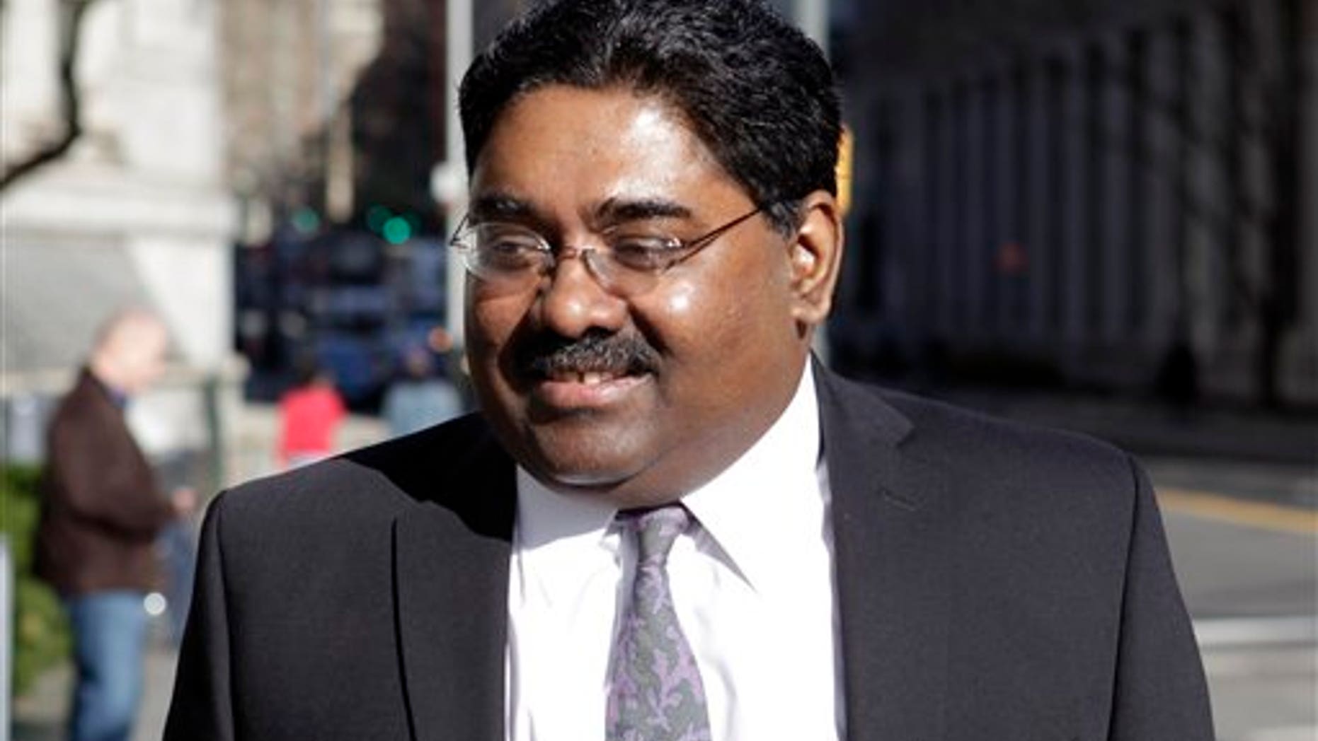 April 14: Raj Rajaratnam enters federal court in New York.