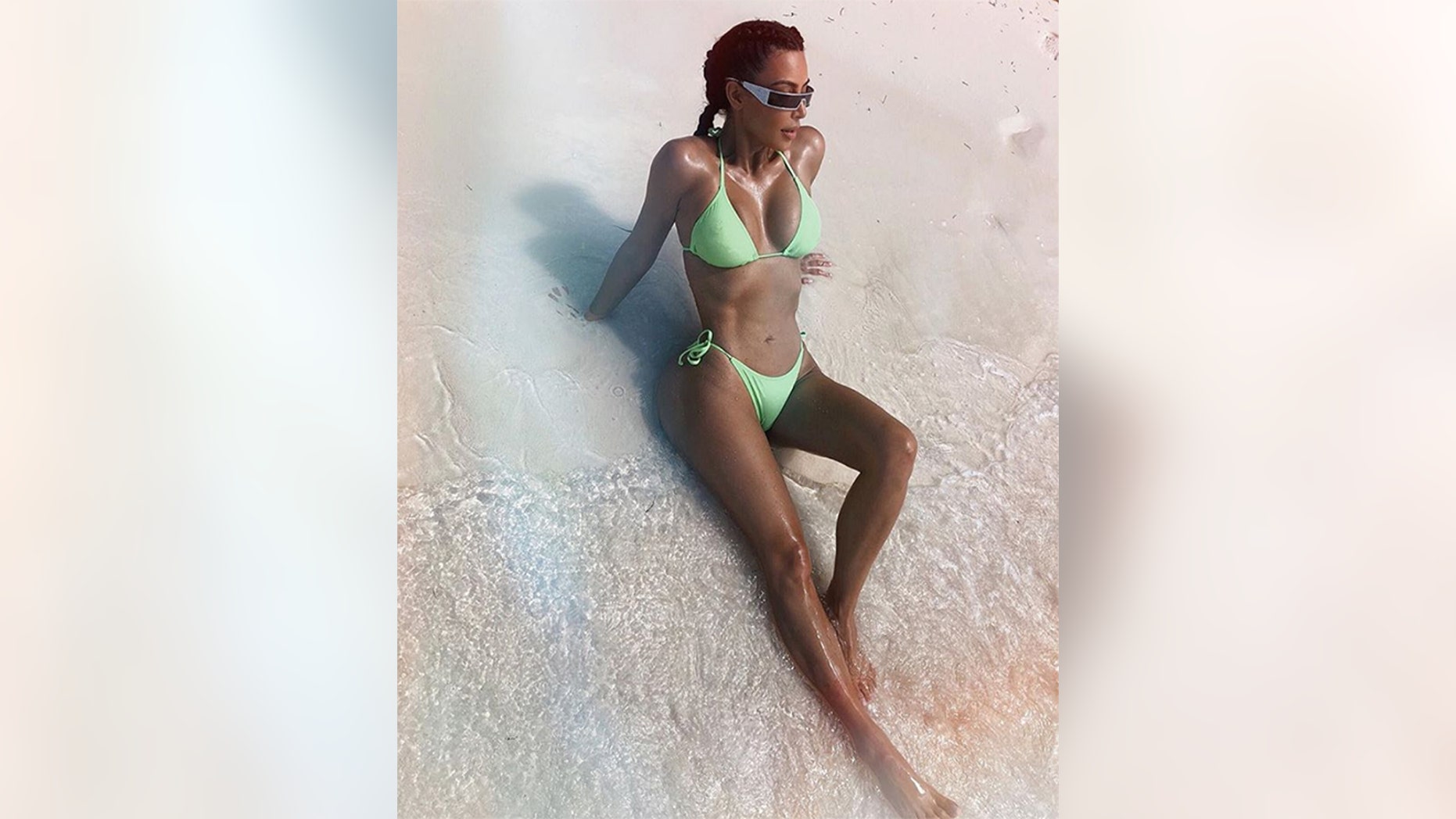 Kim Kardashians apologizes for offending people for her and her sisters comments about her weight loss.