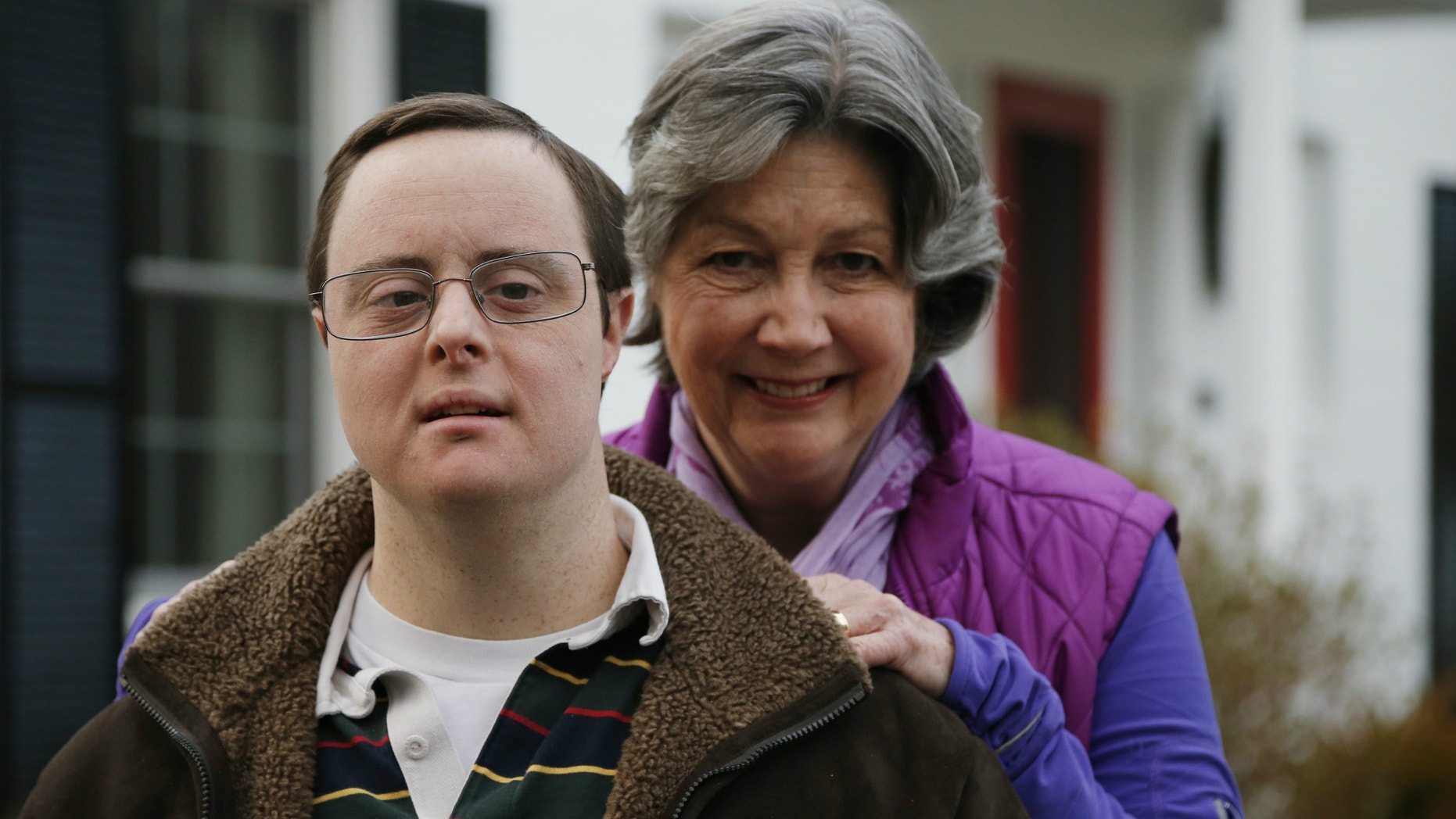 Matthew McMeekin, along with his mother, Bebe McMeekin, pose for a photograph at their home in Bethesda, Md. Most Americans with intellectual or developmental disabilities remain shut out of the workforce, despite changing attitudes and billions spent on government programs to help them.