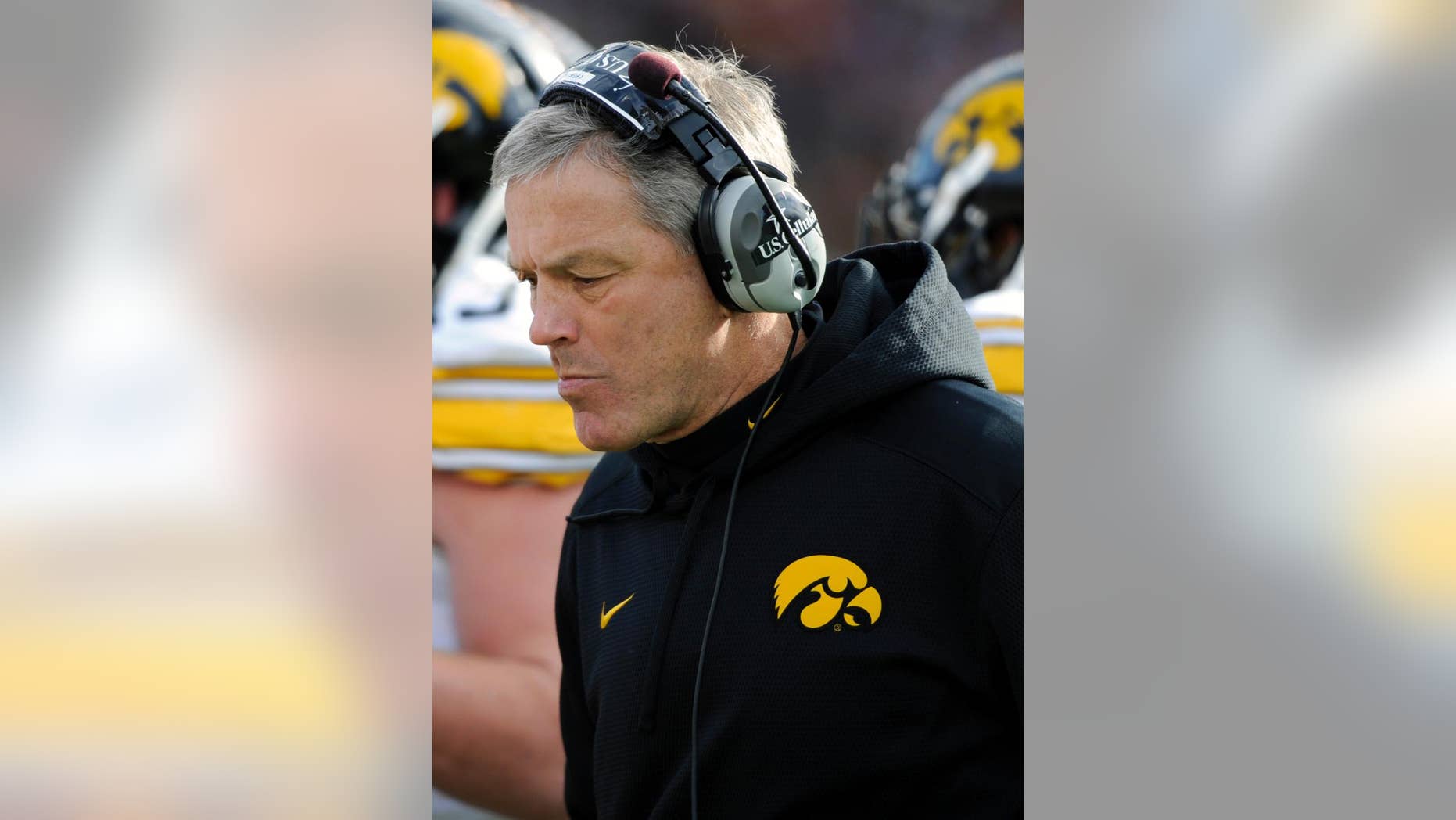 Iowa head coach Kirk Ferentz watches his team during the third quarter of an NCAA college football game against Minnesota on Saturday, Nov. 8, 2014, in Minneapolis. Minnesota won 51-14. (AP Photo/Hannah Foslien)