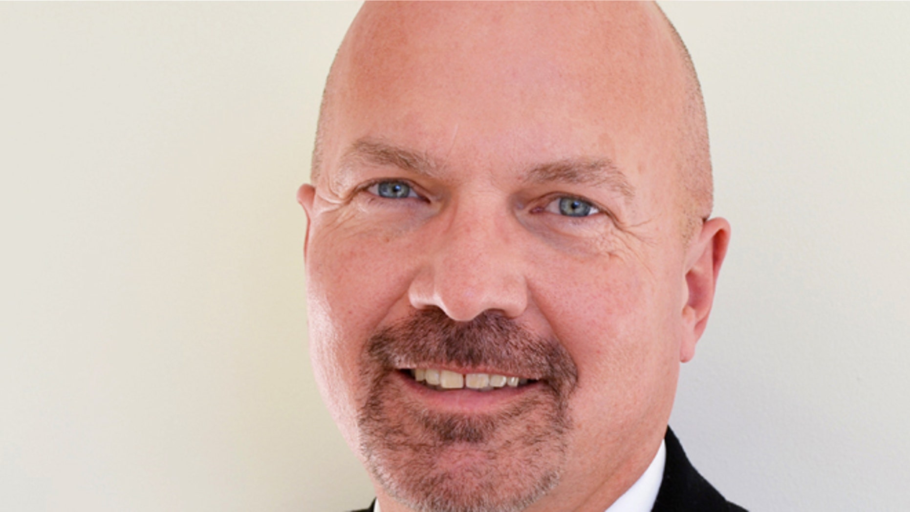In this photo provided by Mercy Medical Center is Dr. Douglas Butzier. The Dubuque, Iowa, doctor who was running as a Libertarian candidate for U.S. Senate, died in a plane crash Monday near Dubuque Regional Airport, authorities said Tuesday, Oct. 14, 2014.