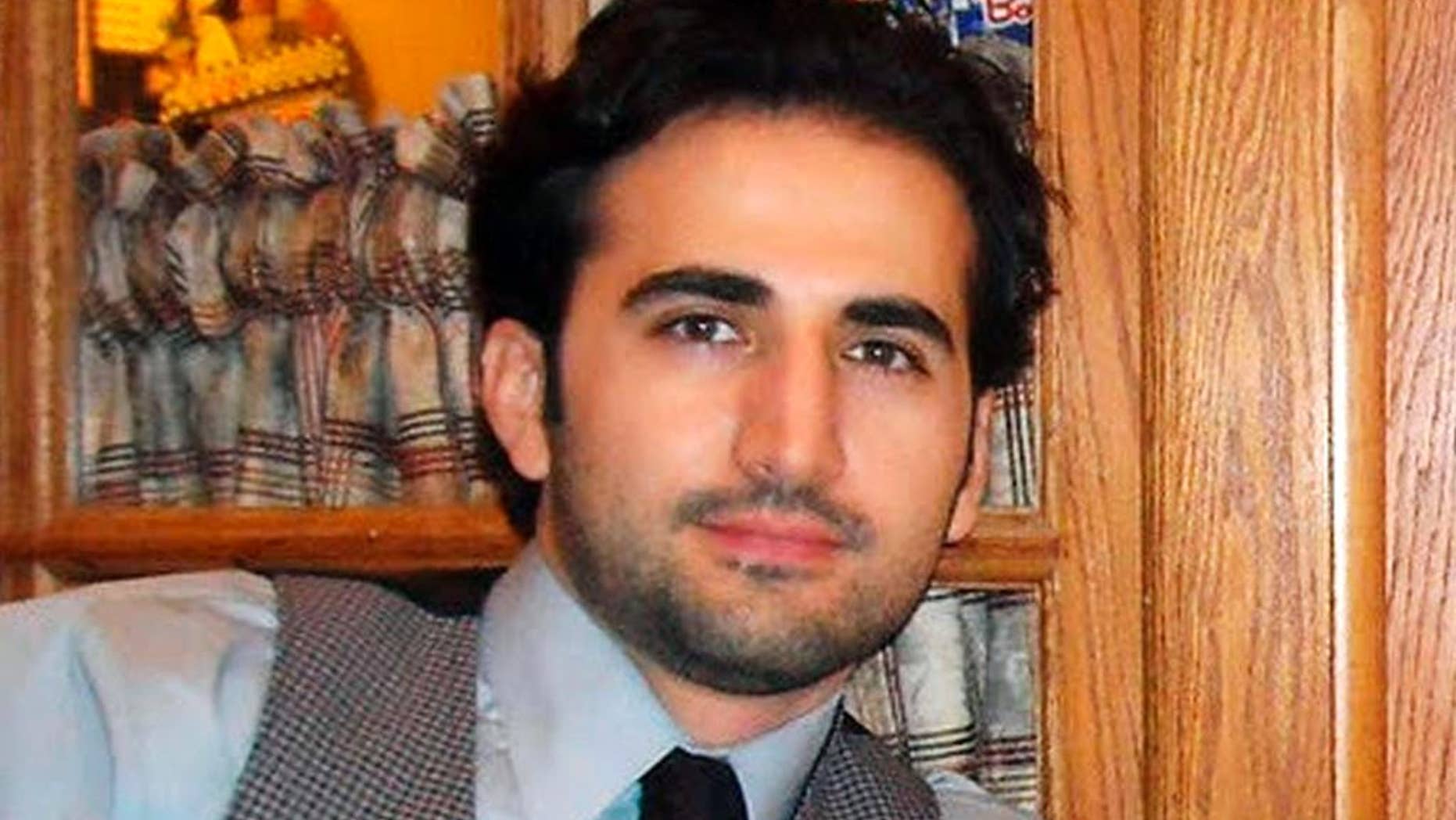 Amir Hekmati, a former U.S. Marine being held in Iran over the past two years was convicted of criminal charges after being accused of working for the CIA. (AP Photo/Hekmati family via FreeAmir.org, File)