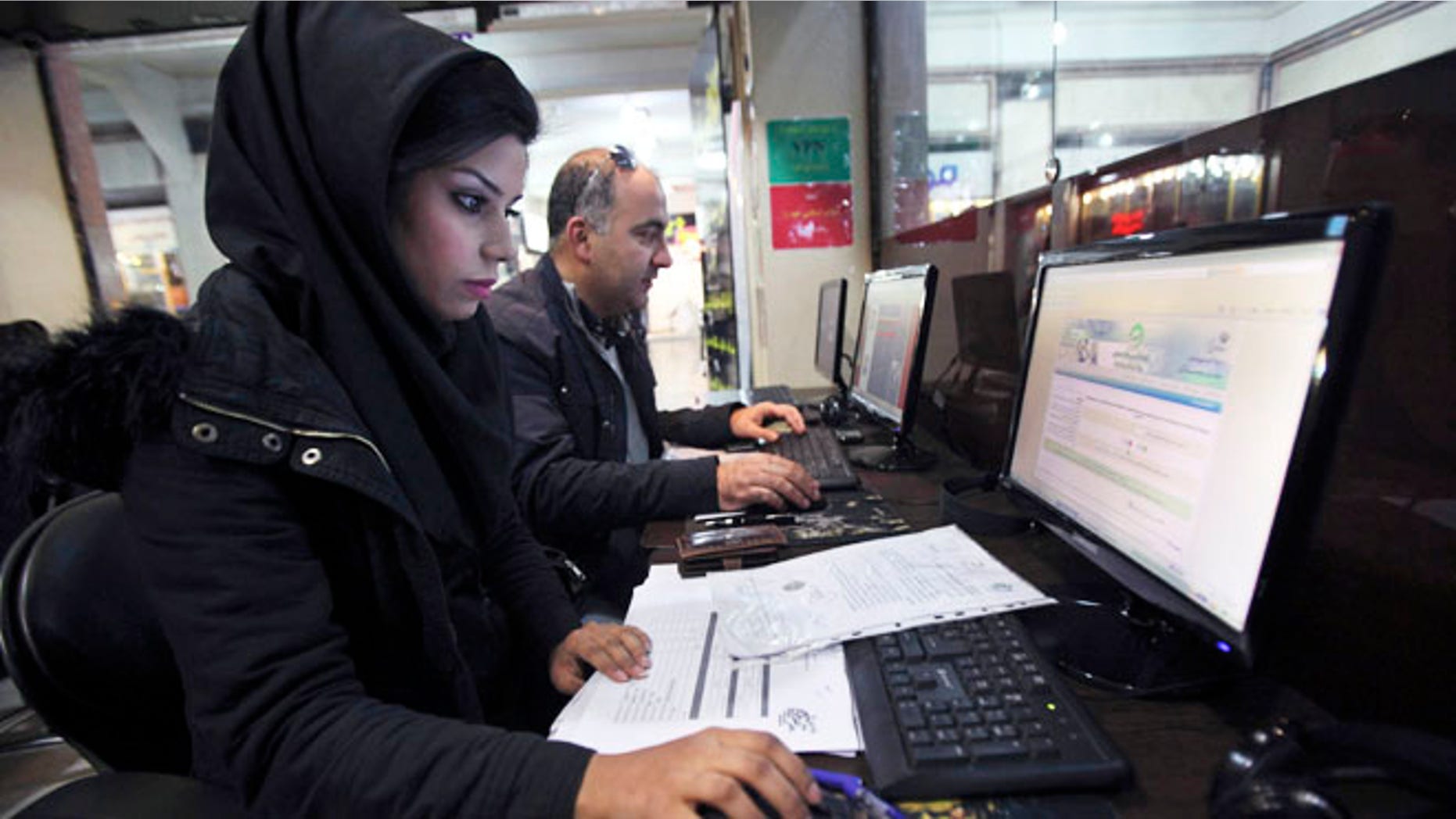Jan. 6, 2013: Iranians surf the web in an internet cafe at a shopping center, in central Tehran. Iranian authorities have blocked many foreign-based virtual private networks, or VPNs, severely restricting access to many websites.
