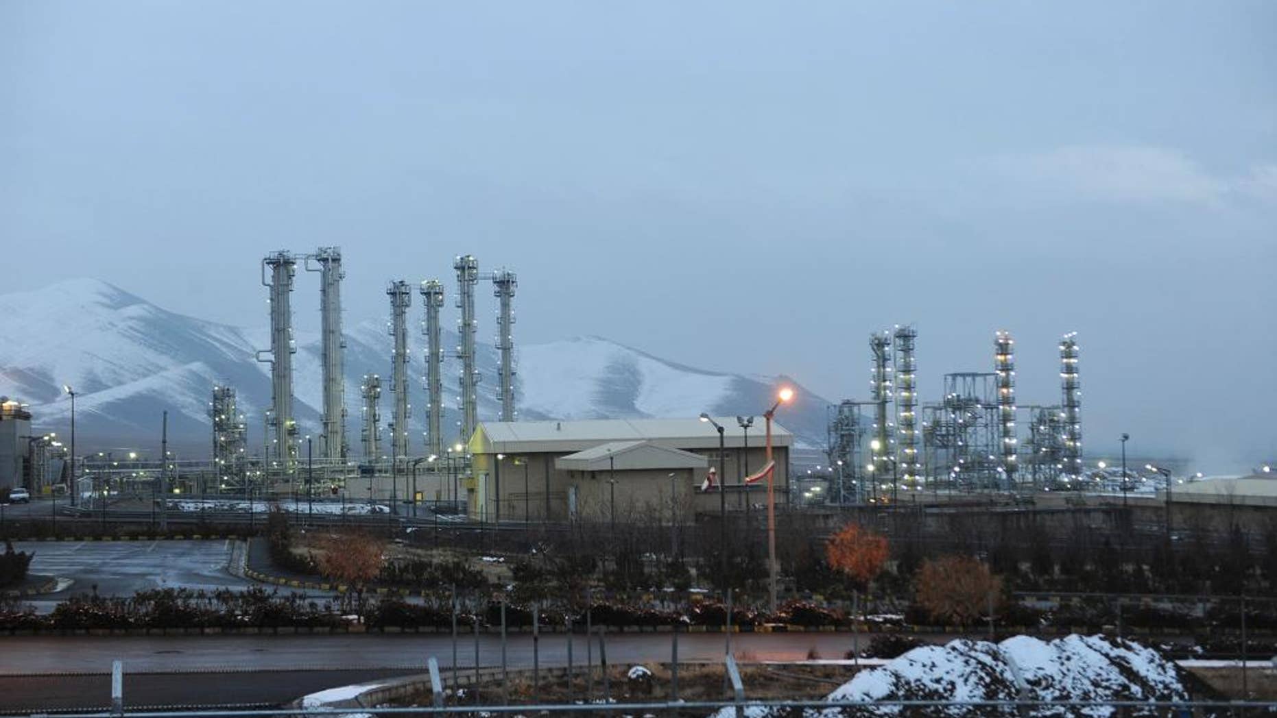 FILE - In this Jan. 15, 2011 file photo, Iran's heavy water nuclear facility is backdropped by mountains near the central city of Arak, Iran. A senior Iranian official said Monday, March 17, 2014, that an alleged attempt to sabotage one of Tehran's nuclear facilities, the nuclear reactor at Arak in the center of the country, involved foreign intelligence agencies who tampered with imported pumps. Tehran has accused the Israel, the U.S. and their allies of undermining Iran's nuclear program through covert operations. (AP Photo/ISNA, Hamid Foroutan, File)
