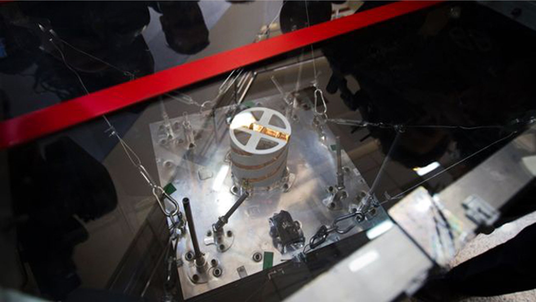 Feb. 29, 2012: A qualification model of the Navid-1 satellite is displayed for journalists during a visit to the Iranian Space Agency (ISA) in Mahdasht, about 60 km west of Tehran.