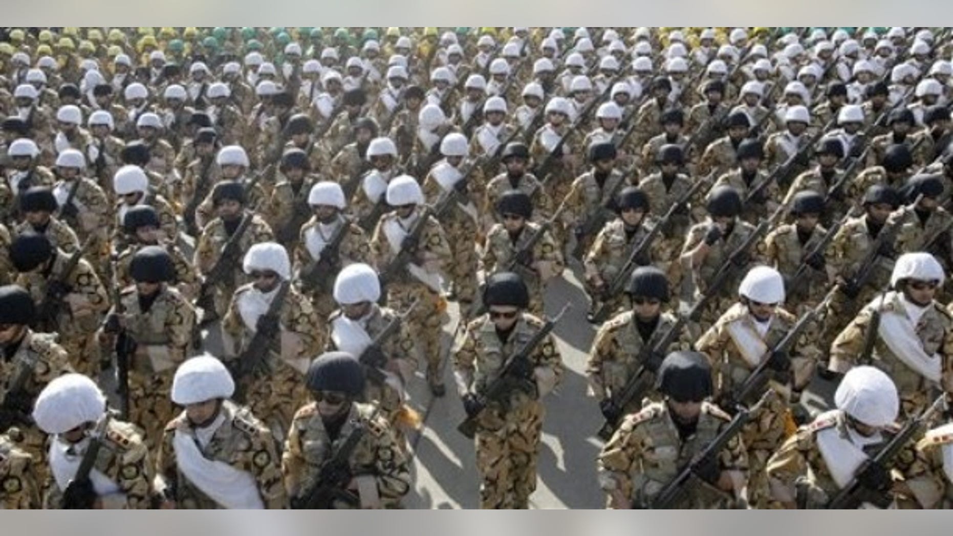 April 17, 2012: Iranian troops march during a military parade commemorating National Army Day in front of the mausoleum of the late revolutionary founder Ayatollah Khomeini, outside Tehran, Iran.
