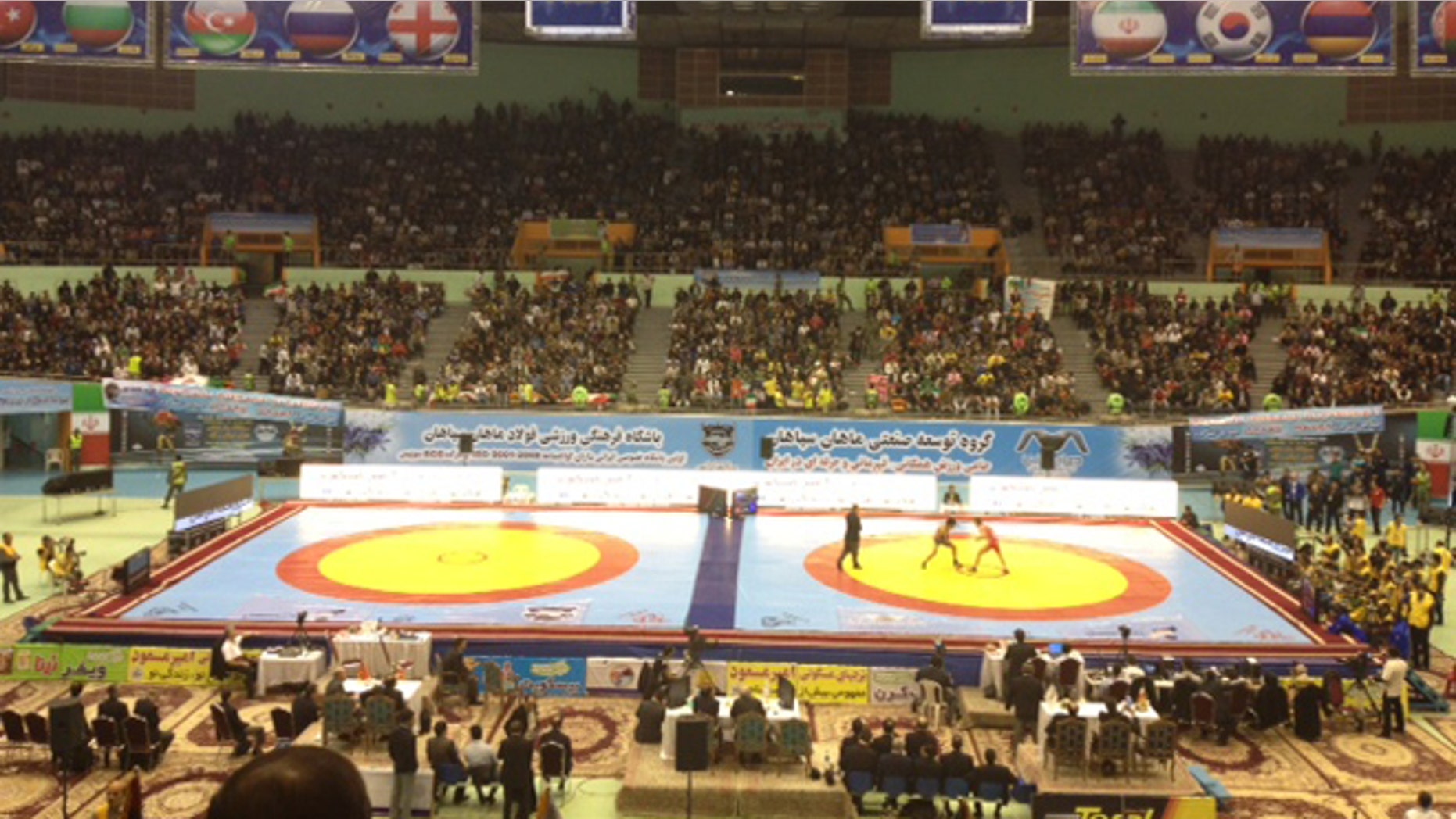 Feb. 21: A sell-out crowd in Tehran's Azadi Sport Complex watches the Freestyle World Cup.