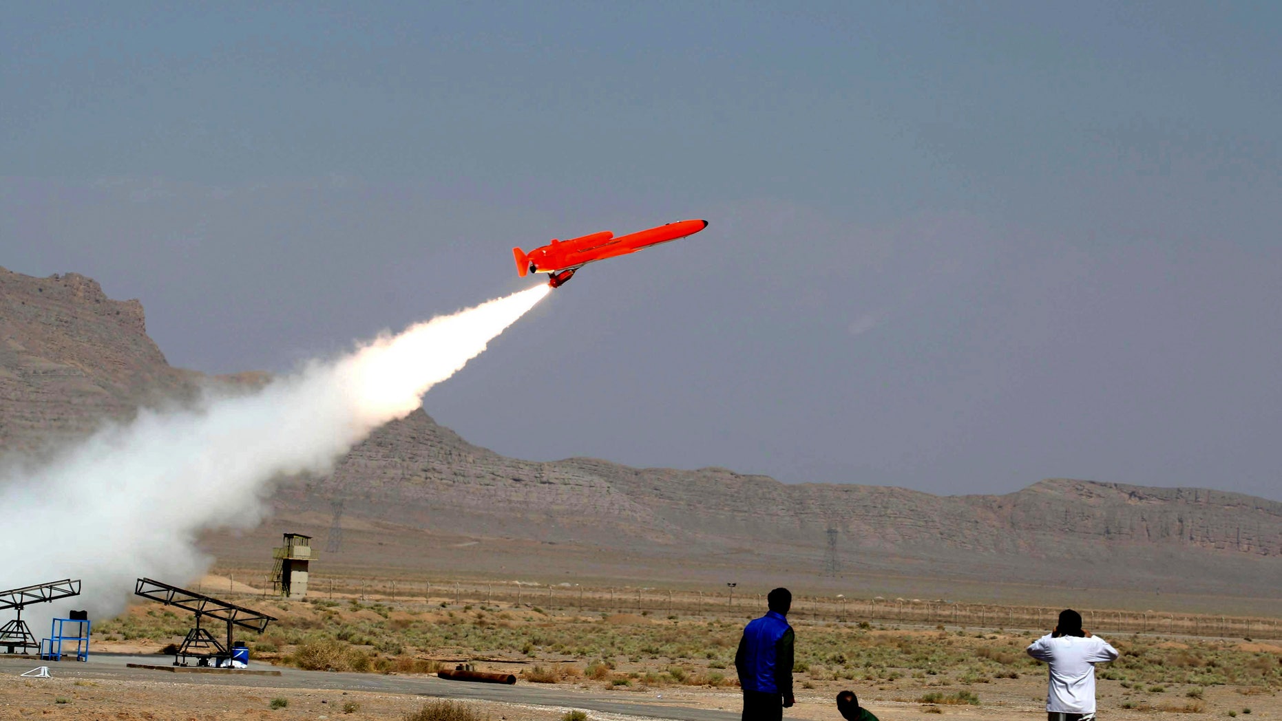 This file photo released on Sunday, Aug. 22, 2010, by the Iranian Defense Ministry, claims to show the launch of the Karrar, or striker in Farsi, the country's first domestically-built, long-range, unmanned bomber aircraft at an undisclosed location. In military maneuvers and air shows, Iran has been proudly touting advances in its air forces and defenses, including radar systems, anti-aircraft batteries and new attack and reconnaissance drones.