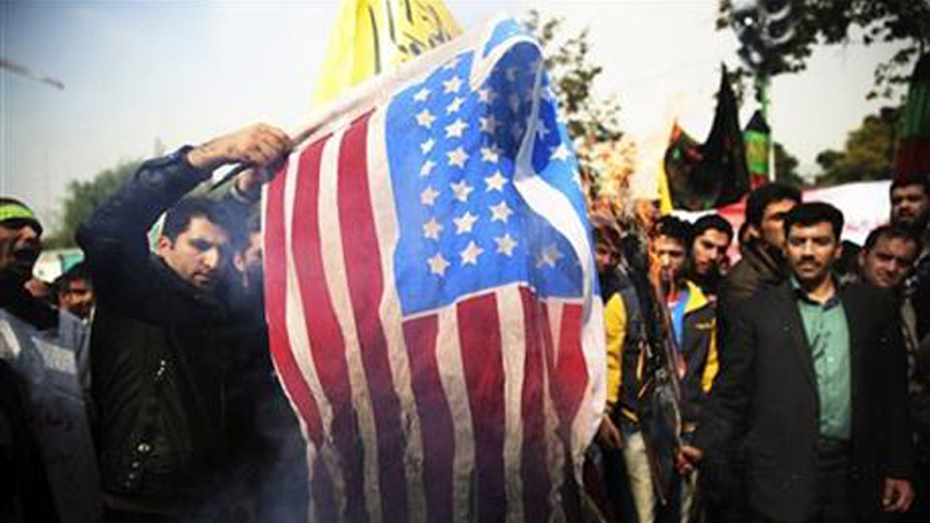 Sanctions on Iran are causing economic hardship, but may be making strapped Iranians angrier with the Us> than their own leaders. (AP)