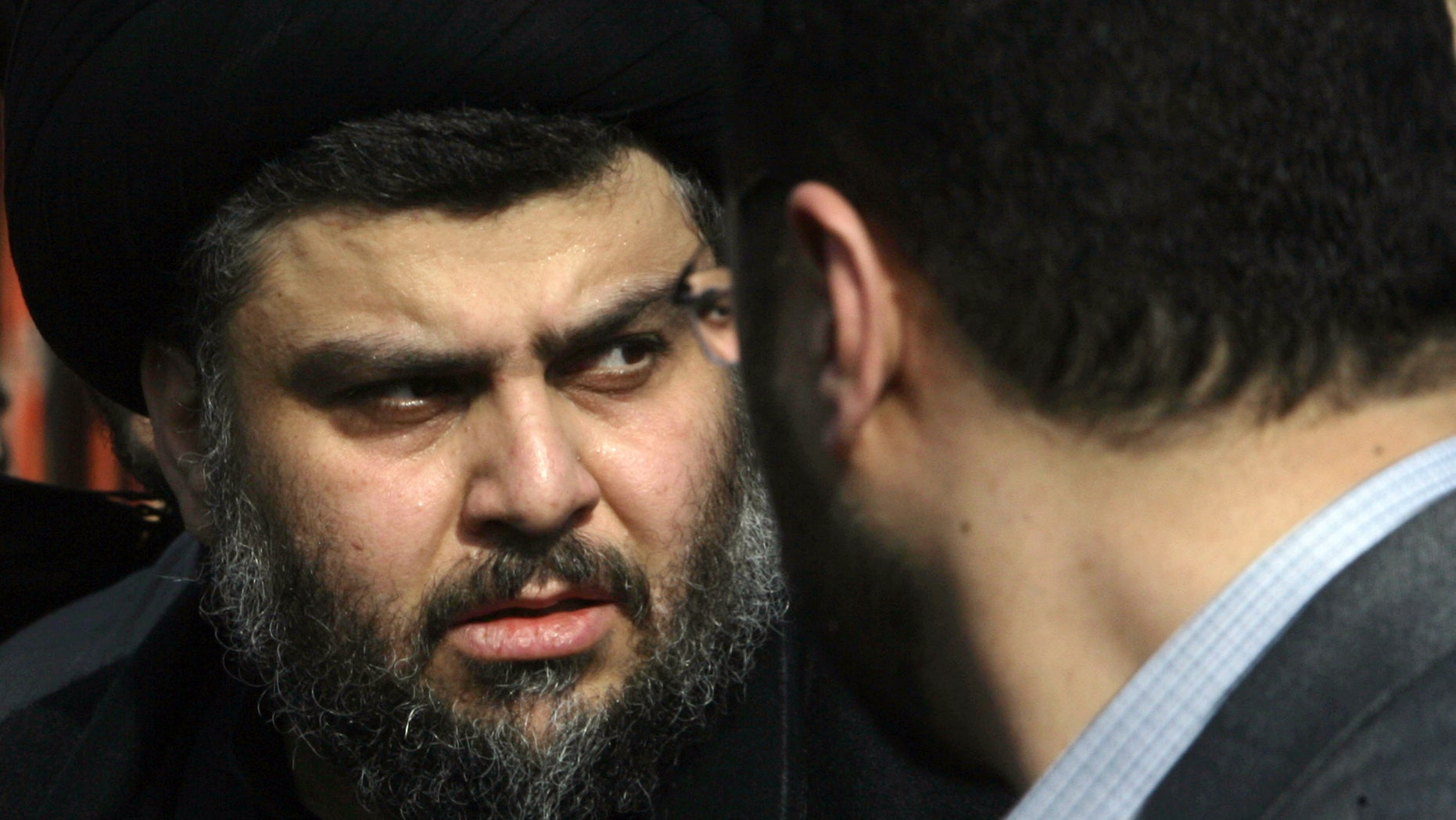 Jan. 9: Shiite Cleric Muqtada al-Sadr visits the the Imam Abbas Shrine in Karbala, Iraq.
