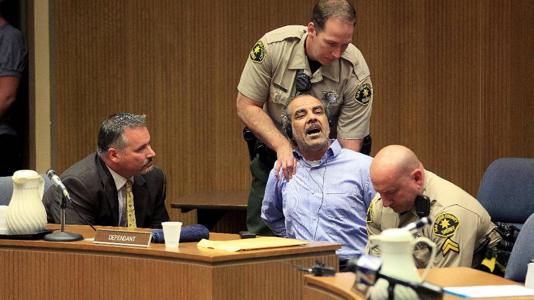 Murder suspect Kassim Alhimidi reacts to being found guilty for the murder of his wife Shaima Alawadi, Thursday April 17, 2014. Alhimidi shook his head as the verdict was read Thursday. He was charged with murdering his 32-year-old wife, Shaima Alawadi, in El Cajon, home to one of the largest enclaves of Iraqi immigrants in the U.S. (AP Photo/John Gastaldo,Pool)