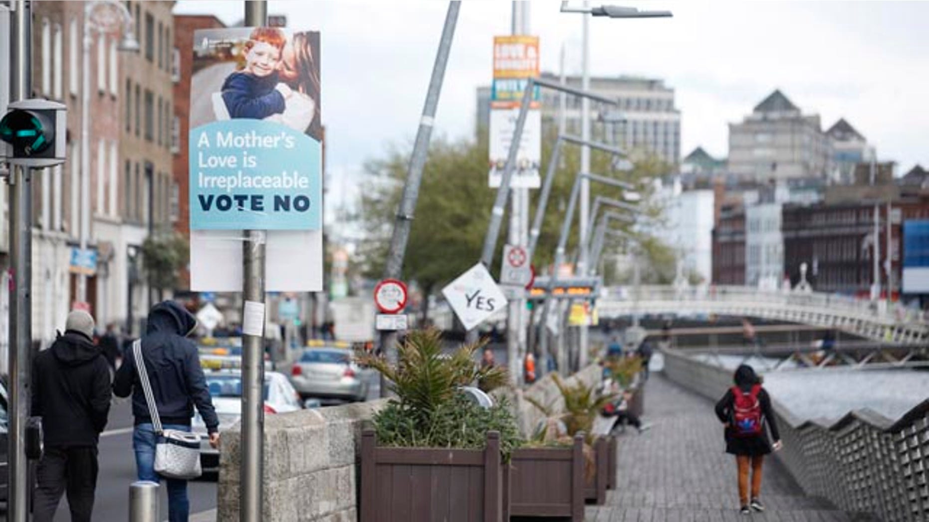May 18, 2015: No and Yes campaign posters are seen in Dublin, Ireland. (AP Photo/Peter Morrison)