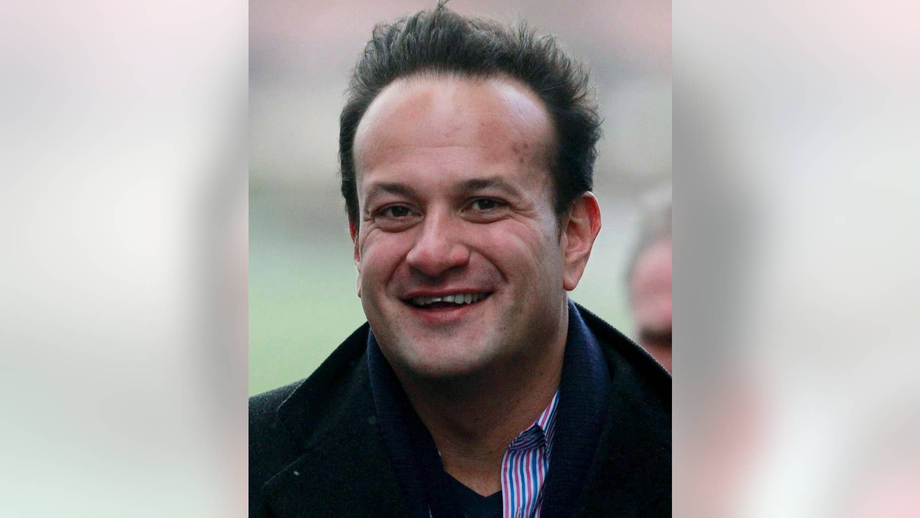 FILE - In this Dec. 27, 2013 file photo, shows health minister Leo Varadkar in Dublin, Ireland. Senior Cabinet minister in Ireland, Leo Varadkar, has announced he is homosexual, becoming the first openly gay government figure in the history of the traditionally conservative Catholic country. The announcement on Sunday Jan. 18, 2015, on state radio received widespread praise for its straightforward honesty. (AP Photo/PA, Brian Lawless, File) UNITED KINGDOM OUT NO SALES NO ARCHIVE