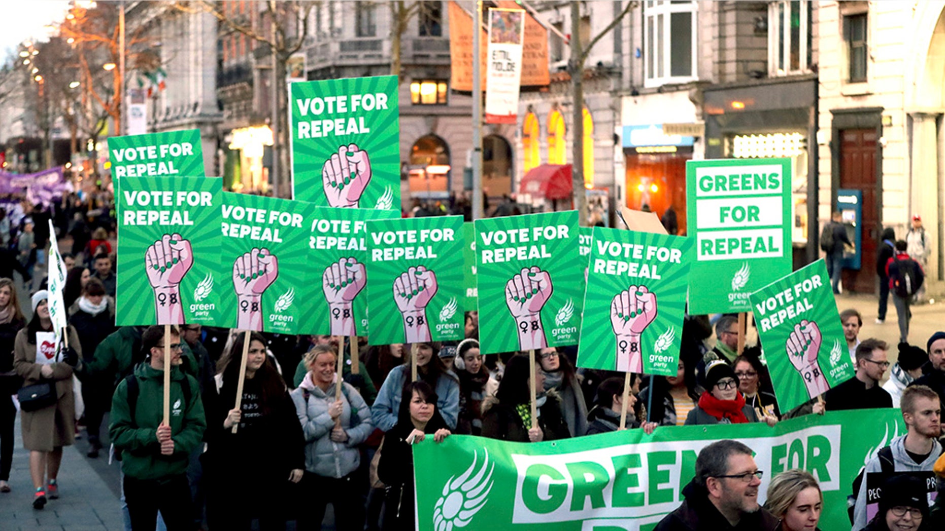 Pro-repeal demonstrators march ahead of Ireland's scheduled May 25 referendum on whether to repeal the 8th amendment to the Irish constitution, in Dublin, March 8, 2018.