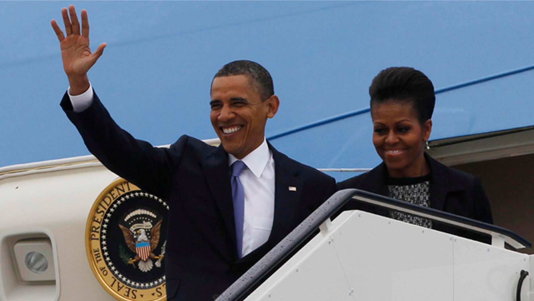 May 23: U.S. President Barack Obama and first lady Michelle Obama step off Air Force One as they arrive in Dublin, Ireland. President Barack Obama opens a six-day European tour with a quick dash through Ireland, where he will celebrate his own Irish roots and look to give a boost to a nation grappling with the fallout from its financial collapse.