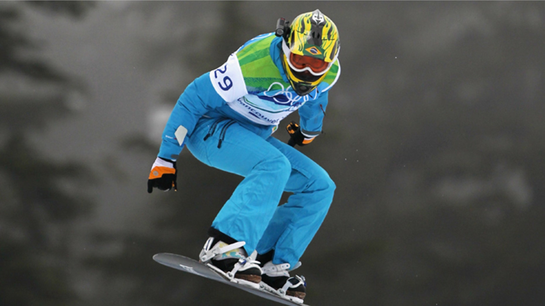 VANCOUVER, BC - FEBRUARY 16: Isabel Clark Ribeiro of Brazil competes during the Ladies' Snowboard cross on day 5 of the Vancouver 2010 Winter Olympics at Cypress Snowboard & Ski-Cross Stadium on February 16, 2010 in Vancouver, Canada. (Photo by Streeter Lecka/Getty Images) *** Local Caption *** Isabel Clark Ribeiro