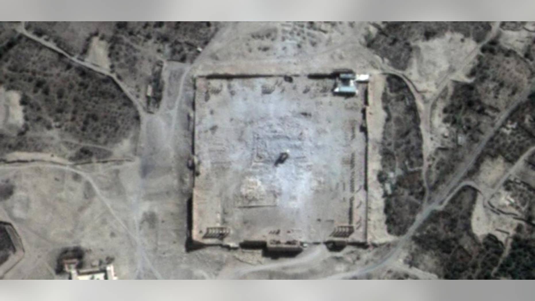 This Monday, Aug. 31, 2015 satellite image provided by UNITAR-UNOSAT shows damage to the main building of the ancient Temple of Bel in the Palmyra, Syria. The main building has been destroyed, a United Nations agency said. The image was taken a day after a massive explosion was set off near the 2,000-year-old temple in the city occupied by Islamic State militants. (UrtheCast, UNITAR-UNOSAT via AP)
