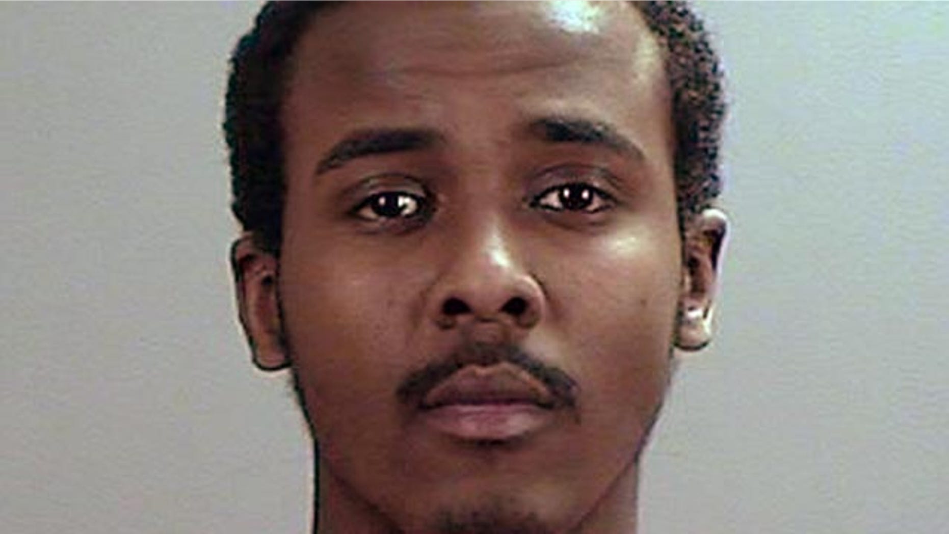 May 21, 2015: This undated photo provided the Sherburne County, Minn., Sheriffs Office shows Abdirahman Yasin Daud, one of several Minnesota men accused of conspiring to travel to Syria to join the Islamic State group. (Sherburne County Sheriffs Office via AP)