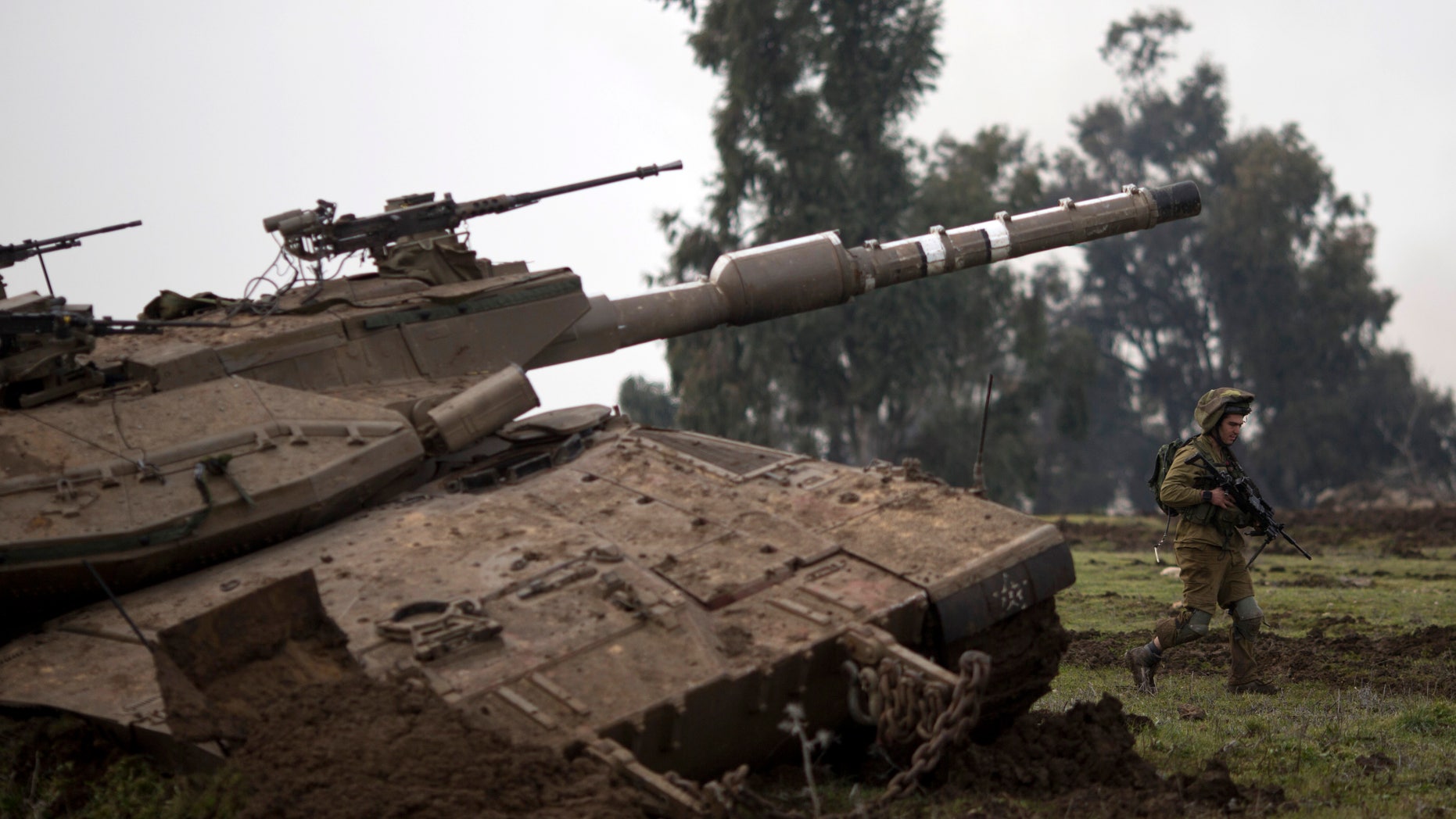 Jan. 19, 2015 - An Israeli soldier of the Golani brigade trains in the Israeli controlled Golan Heights, near Israel-Syria border. The Lebanese militant Hezbollah prepared to bury 6 fighters killed in Syria in what the group described as an Israeli airstrike. Israel did not confirm or deny the strike.