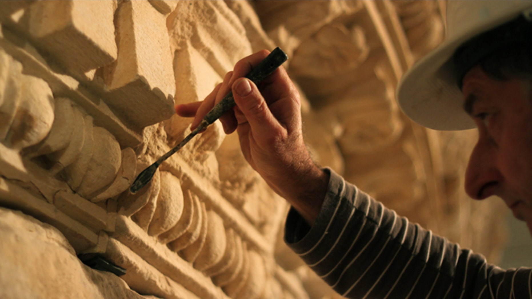 Jan. 15, 2012: A restorer at the Israel Museum works on a reassembled display of what curators say was Herod's tomb in the Israeli museum, Jerusalem. Israel's national museum is opening the world's first exhibition on the King, displaying what it says are the reconstructed tomb and sarcophagus of one of antiquity's most towering and despised figures.
