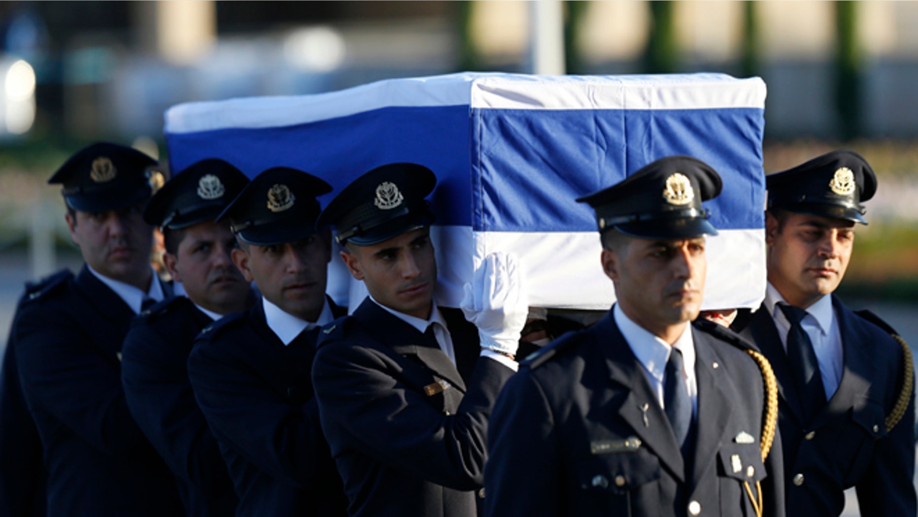 Members of the Knesset guard carry the coffin of former Israeli President Shimon Peres in Jerusalem, Thursday, Sept. 29, 2016.