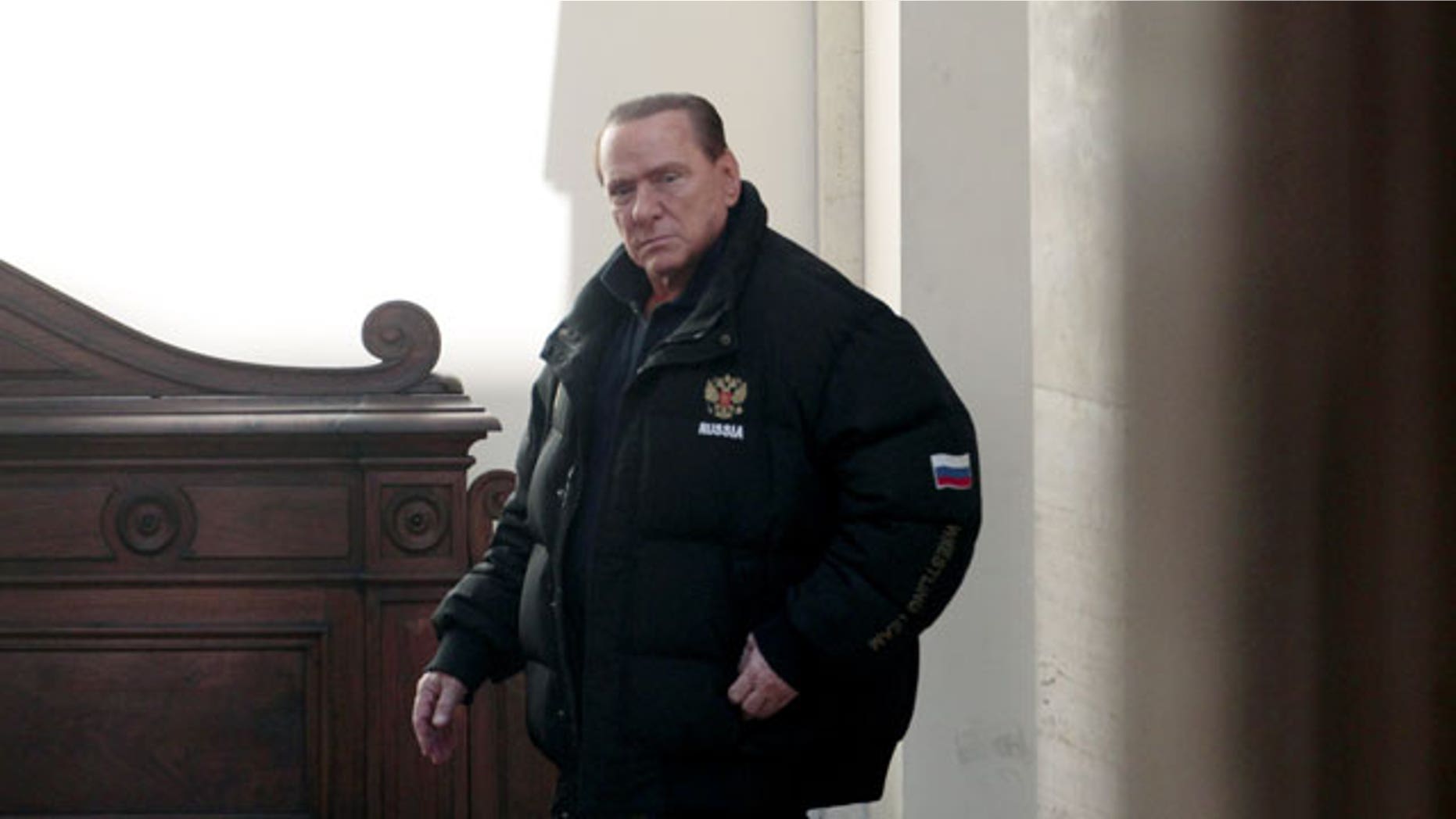 Feb. 25, 2012: Former Italian premier Silvio Berlusconi leaves his residence Palazzo Grazioli in Rome.