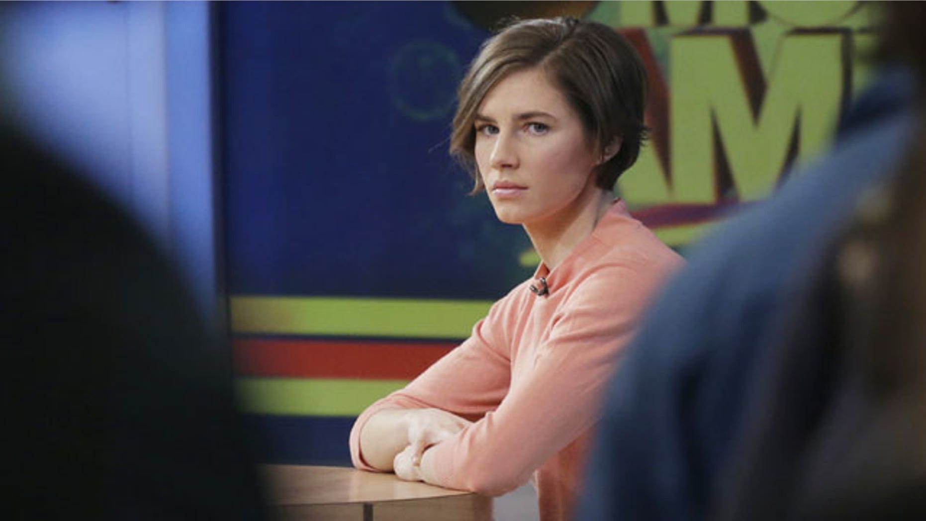 January 31, 2014: Amanda Knox waits on a television set for an interview in New York. Knox said she will fight the reinstated guilty verdict against her and an ex-boyfriend in the 2007 slaying of a British roommate in Italy and vowed to "never go willingly" to face her fate in that country's judicial system . "I'm going to fight this to the very end," she said in an interview with Robin Roberts on ABC's "Good Morning America." (AP Photo/Mark Lennihan)