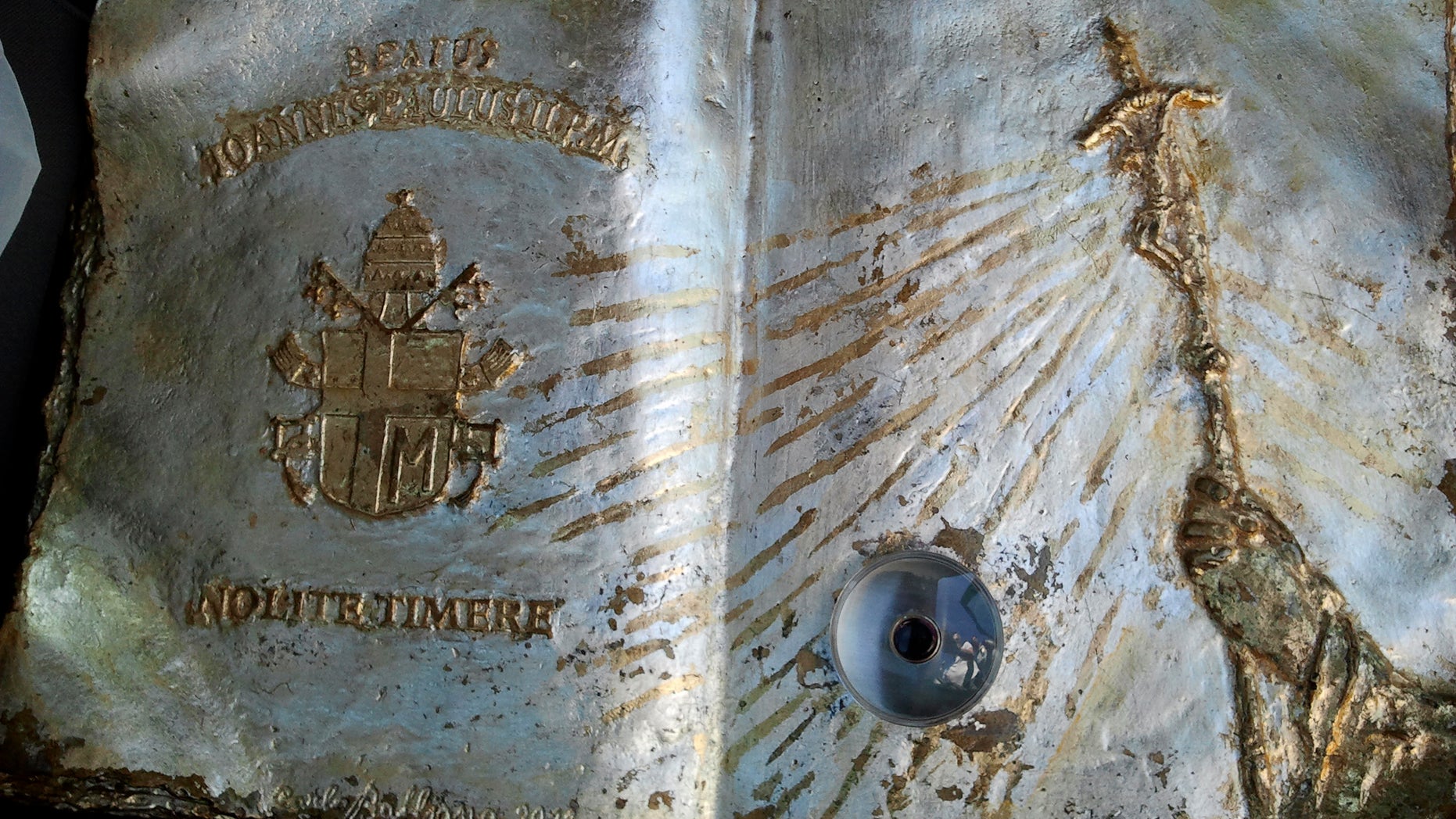 Aug. 28, 2012: This undated photo provided by Italian police shows a relic with a vial containing the late Pope John Paul II's blood. Italian railways police say they have foiled the theft aboard a train of a vial containing the late Pope John Paul II's blood.