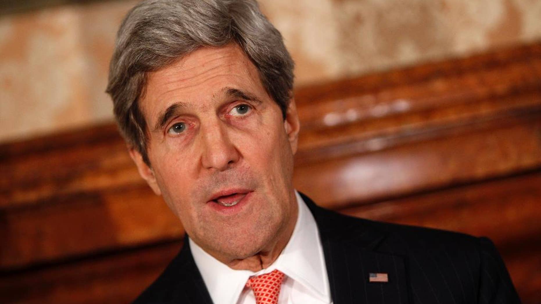 U.S. Secretary of State John Kerry talks to journalists during a briefing with Italian Foreign Minister Federica Mogherini, prior to a dinner at the U.S. Ambassador's Villa Taverna residence in Rome, Thursday, March 6, 2014. (AP Photo/Riccardo De Luca)
