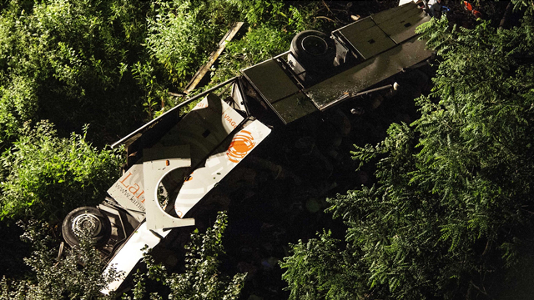 June 29, 2013: A bus lies on its side after plunging off a highway near Avellino, southern Italy.