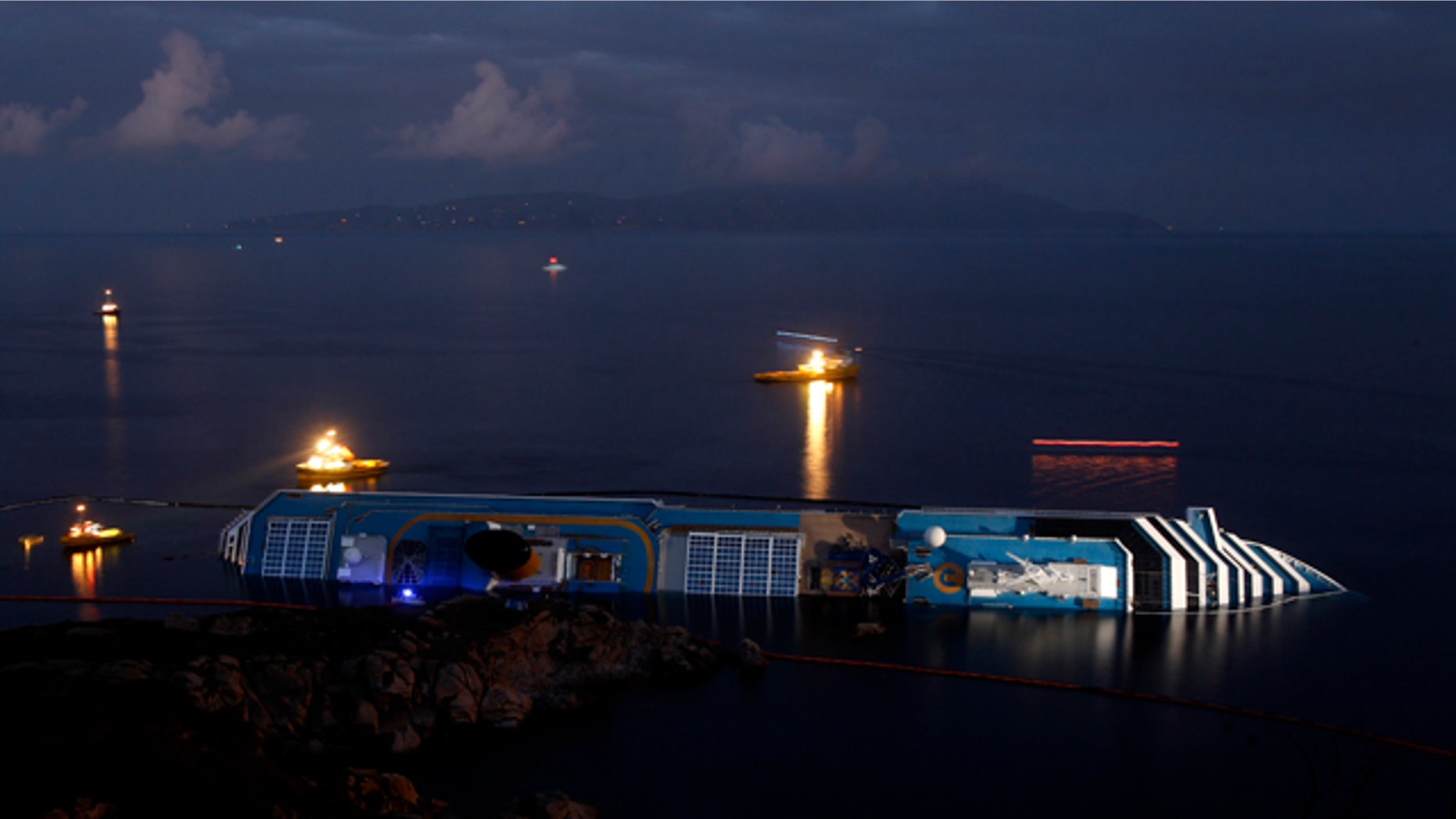 Jan. 23: The grounded cruise ship Costa Concordia lies on its side off the Tuscan island of Giglio, Italy.