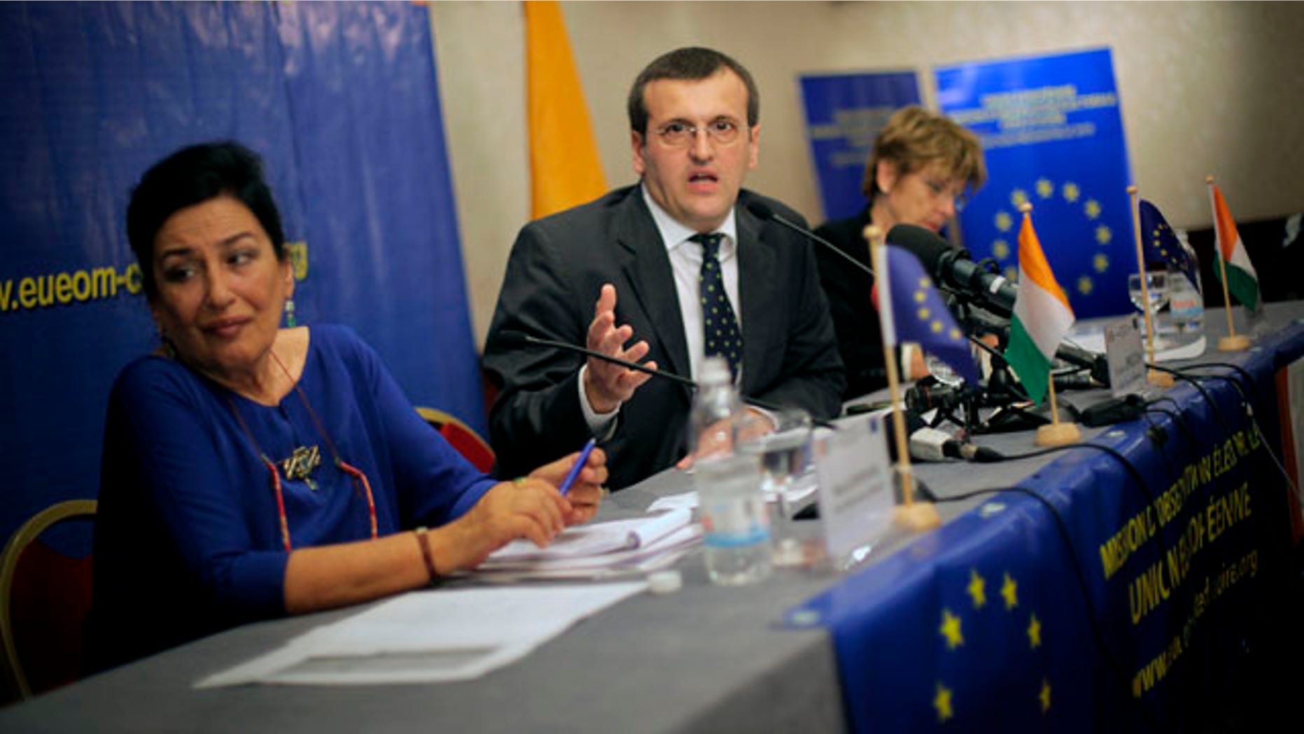 Nov. 2: European Union Chief Elections Observer Cristian Preda, center, from Romania, addresses a news conference in Abidjan, Ivory Coast.