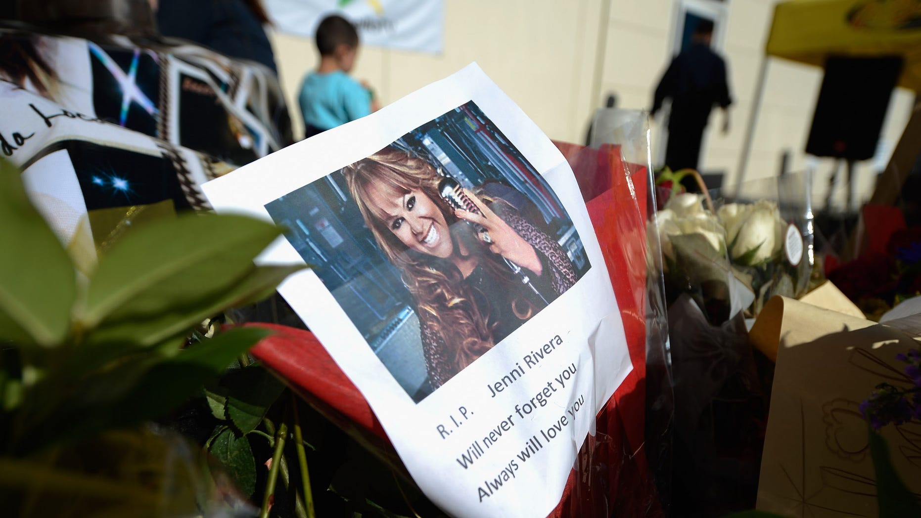 Dec. 10, 2012: Items are displayed at a makeshift memorial for Mexican-American singer Jenni Rivera at a Mexican radio station that is playing her songs continuously all day in Burbank, Calif.