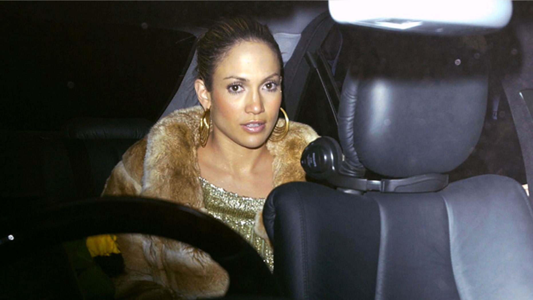 LONDON - FEBRUARY 26: Actress Jennifer Lopez sits in a car after leaving Mezzo restaurant February 26, 2003 in London, England. (Photo by Bruno Vincent/Getty Images)