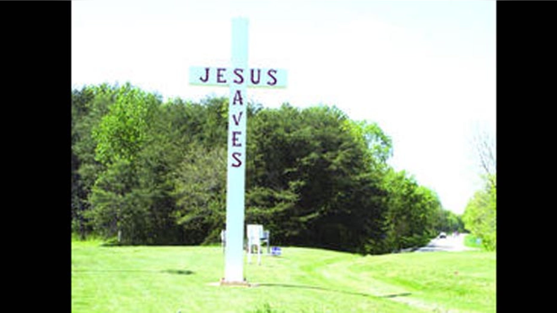 A 26-foot cross planted by the Faith Community Church of Dugger, Ind. stands on publicly-owned land.
