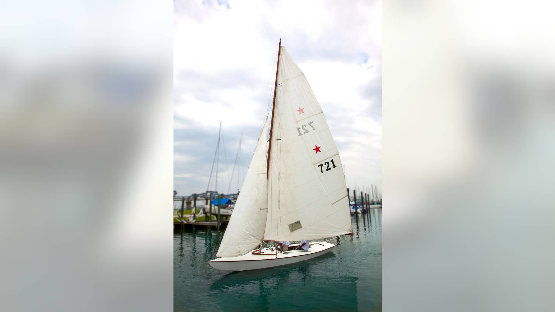 This July 29, 2014 handout photo provided by Heritage Auctions shows John F. Kennedy’s Star Class Sailboat, Flash II, which he owned and raced with older brother Joseph P. Kennedy in the Nantucket Sound Star Fleet between 1934 and 1940. It will be offered for auction on Monday, May 18, 2015, in Dallas, by Heritage Auctions. ( Don Hoffman/Heritage Auctions via AP)