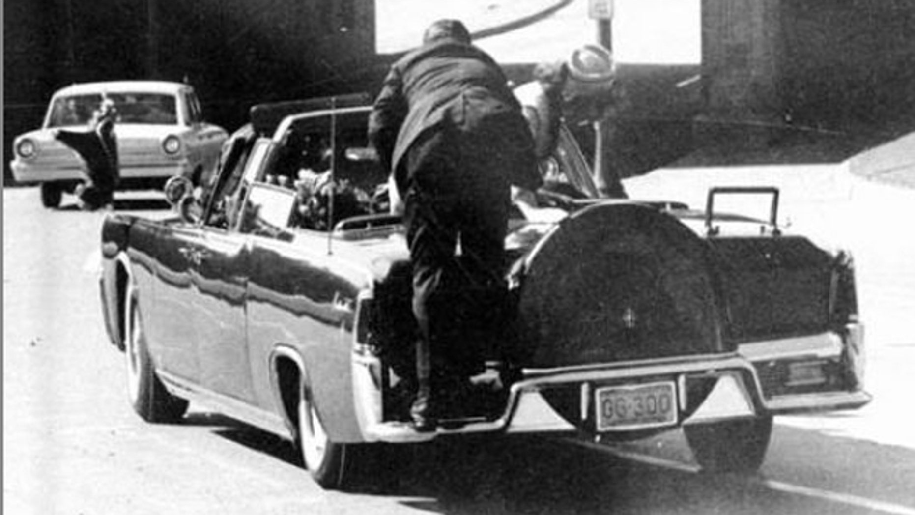 Nov. 22, 1963: President John F. Kennedy is slumped in the backseat of this car immediately after being shot in Dallas.