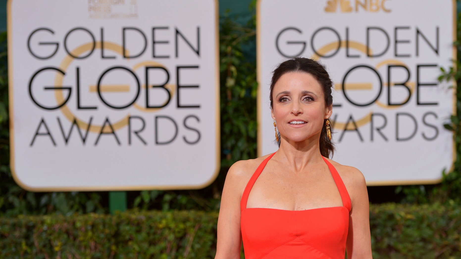Julia Louis-Dreyfus arrives at the 71st annual Golden Globe Awards at the Beverly Hilton Hotel on Sunday, Jan. 12, 2014. (Photo by John Shearer/Invision/AP)
