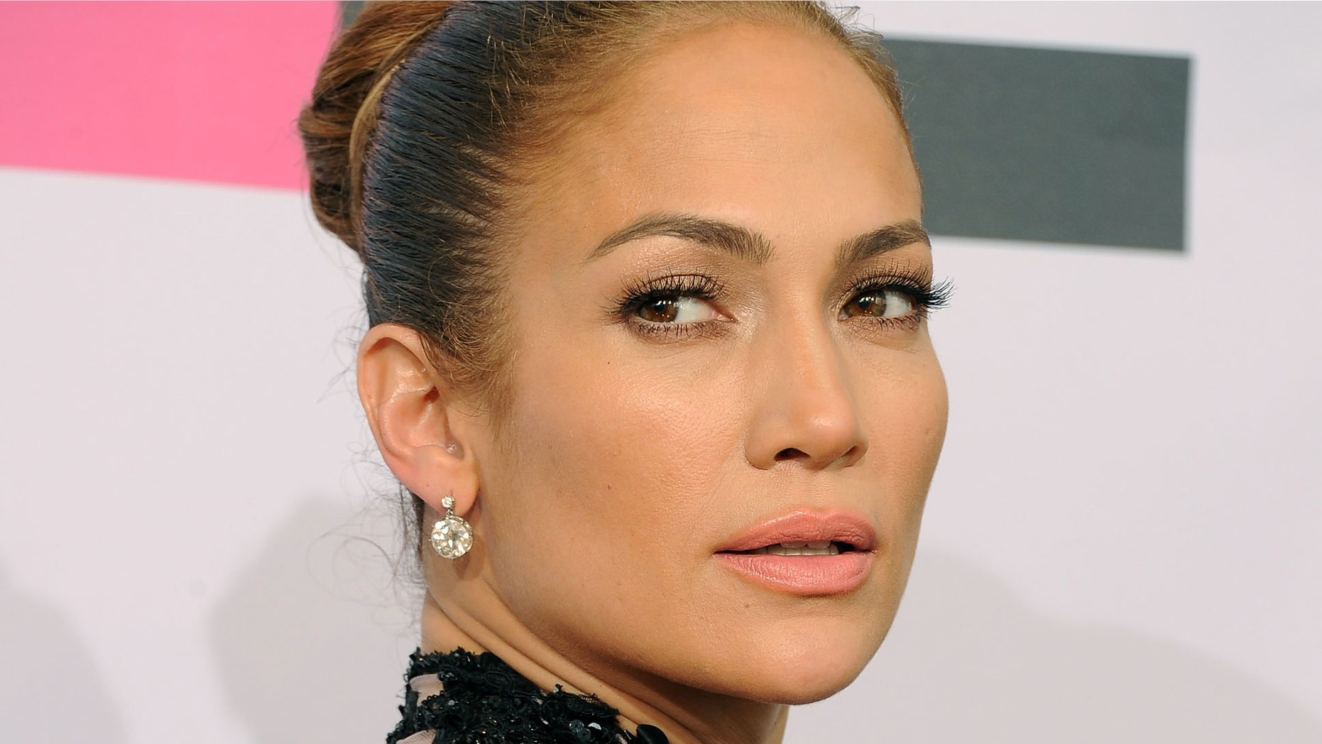 LOS ANGELES, CA - NOVEMBER 20: Singer Jennifer Lopez, winner of Favorite Latin Artist Award, poses in the press room at the 2011 American Music Awards held at Nokia Theatre L.A. LIVE on November 20, 2011 in Los Angeles, California. (Photo by Jason Merritt/Getty Images)