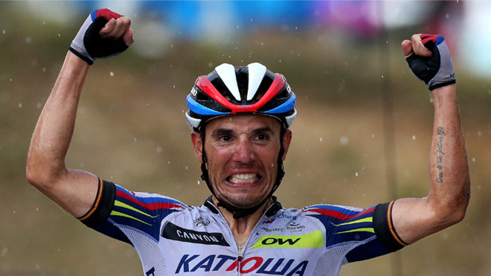 PLATEAU DE BEILLE, FRANCE - JULY 16: Joaquin Rodriguez Oliver of Spain and Team Katusha celebrates as he crosses the finish line to win stage twelve of the 2015 Tour de France, a 195 km stage between Lannemezan and Plateau de Beille, on July 16, 2015 in Plateau de Beille, France. (Photo by Doug Pensinger/Getty Images)