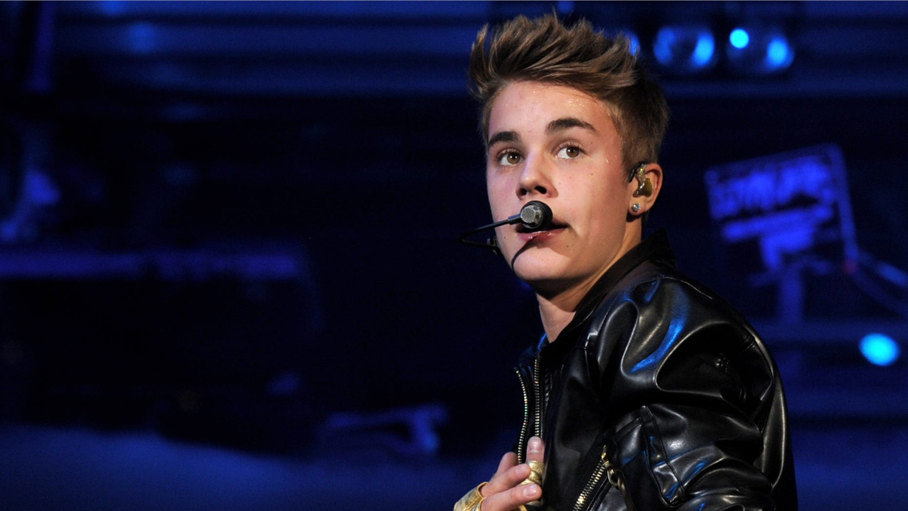 LOS ANGELES, CA - OCTOBER 02: Singer Justin Bieber performs during his "Believe" tour at The Staples Center on October 2, 2012 in Los Angeles, California. (Photo by Kevin Winter/Getty Images)