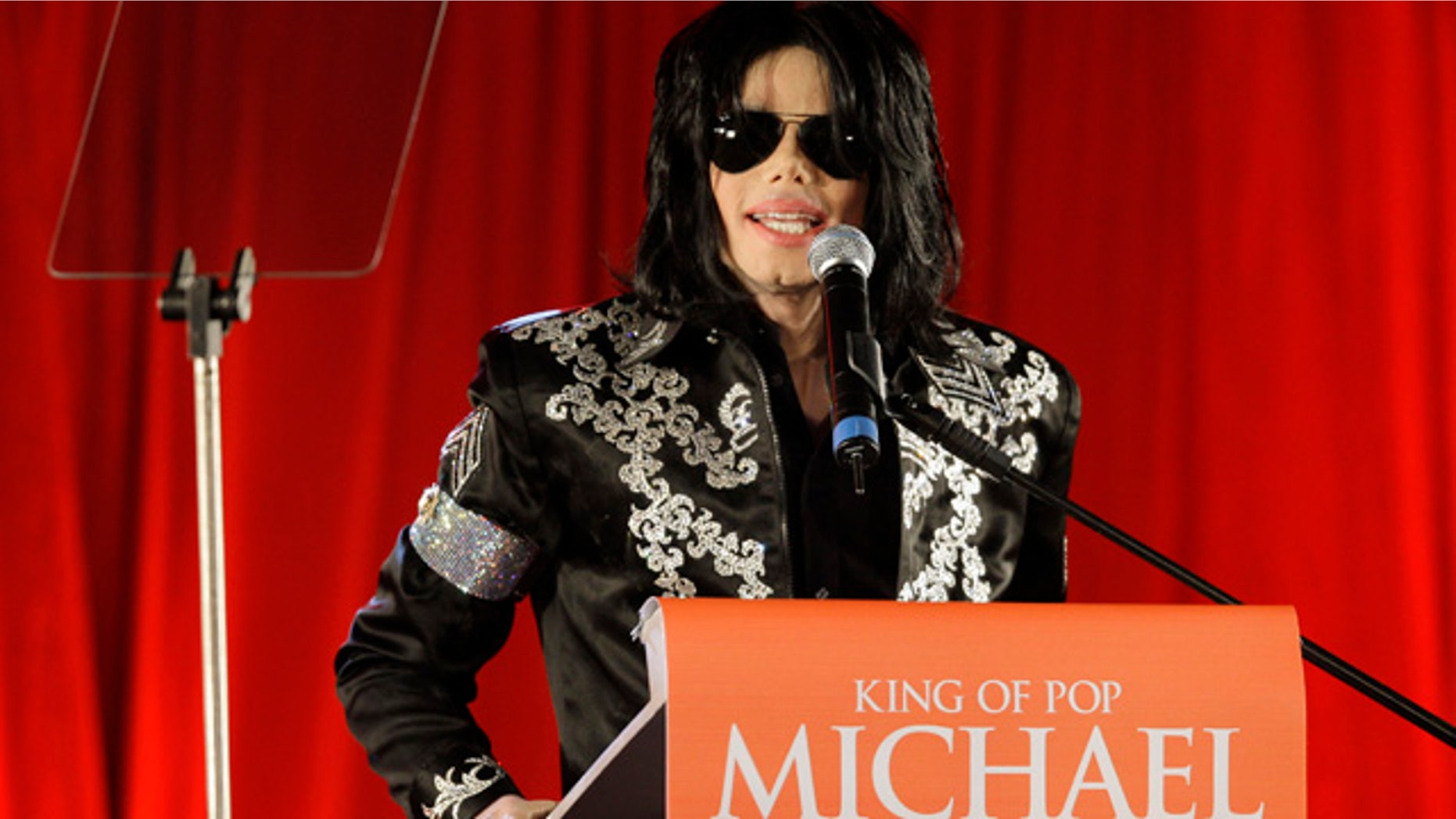 FILE - In this March 5, 2009 file photo, US singer Michael Jackson announces that he is set to play ten live concerts at London's O2 Arena in July (AP Photo/Joel Ryan, File)